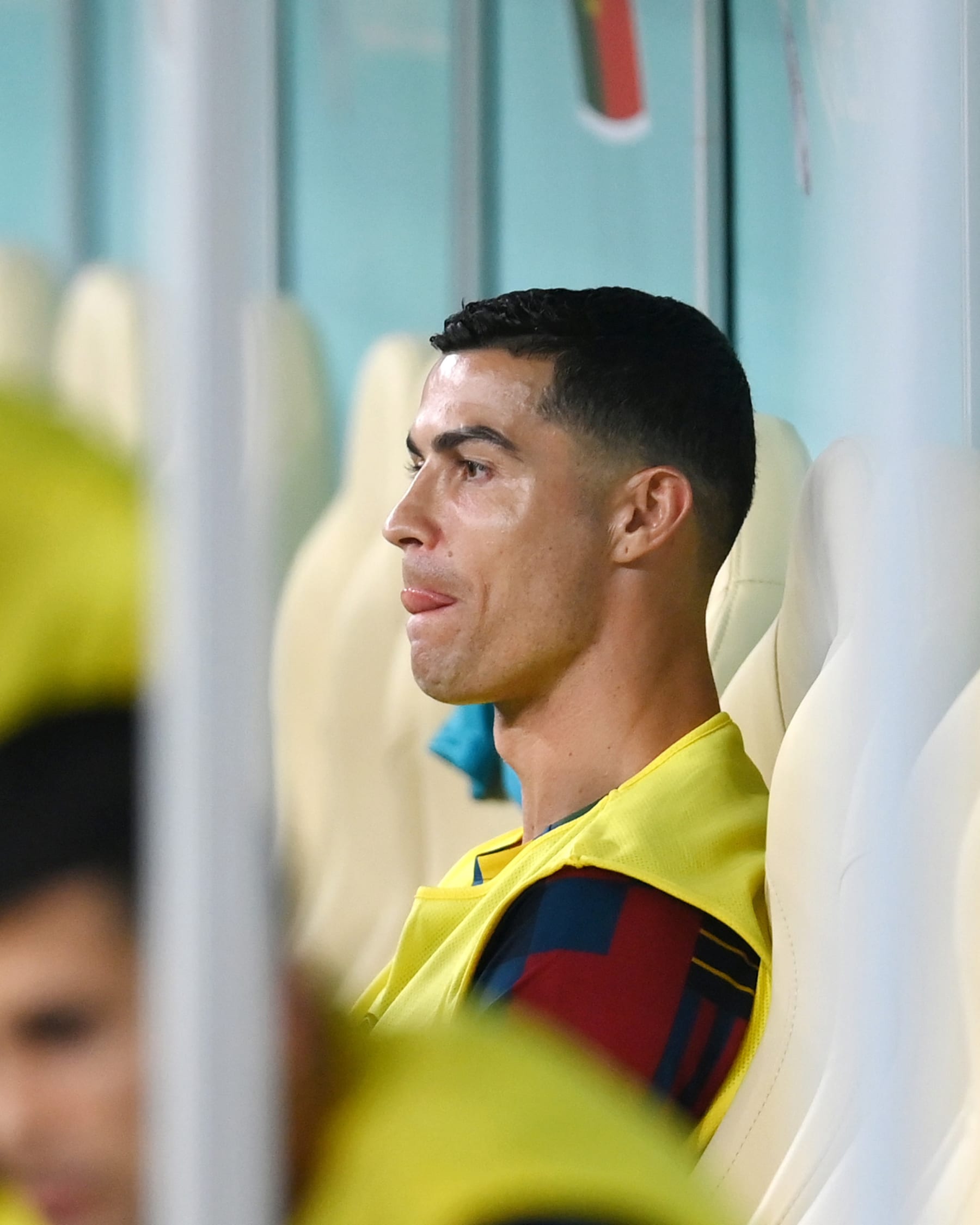 LUSAIL CITY, QATAR - DECEMBER 06: Cristiano Ronaldo of Portugal looks on from the bench during the FIFA World Cup Qatar 2022 Round of 16 match between Portugal and Switzerland at Lusail Stadium on December 06, 2022 in Lusail City, Qatar. (Photo by Mike Hewitt - FIFA/FIFA via Getty Images)