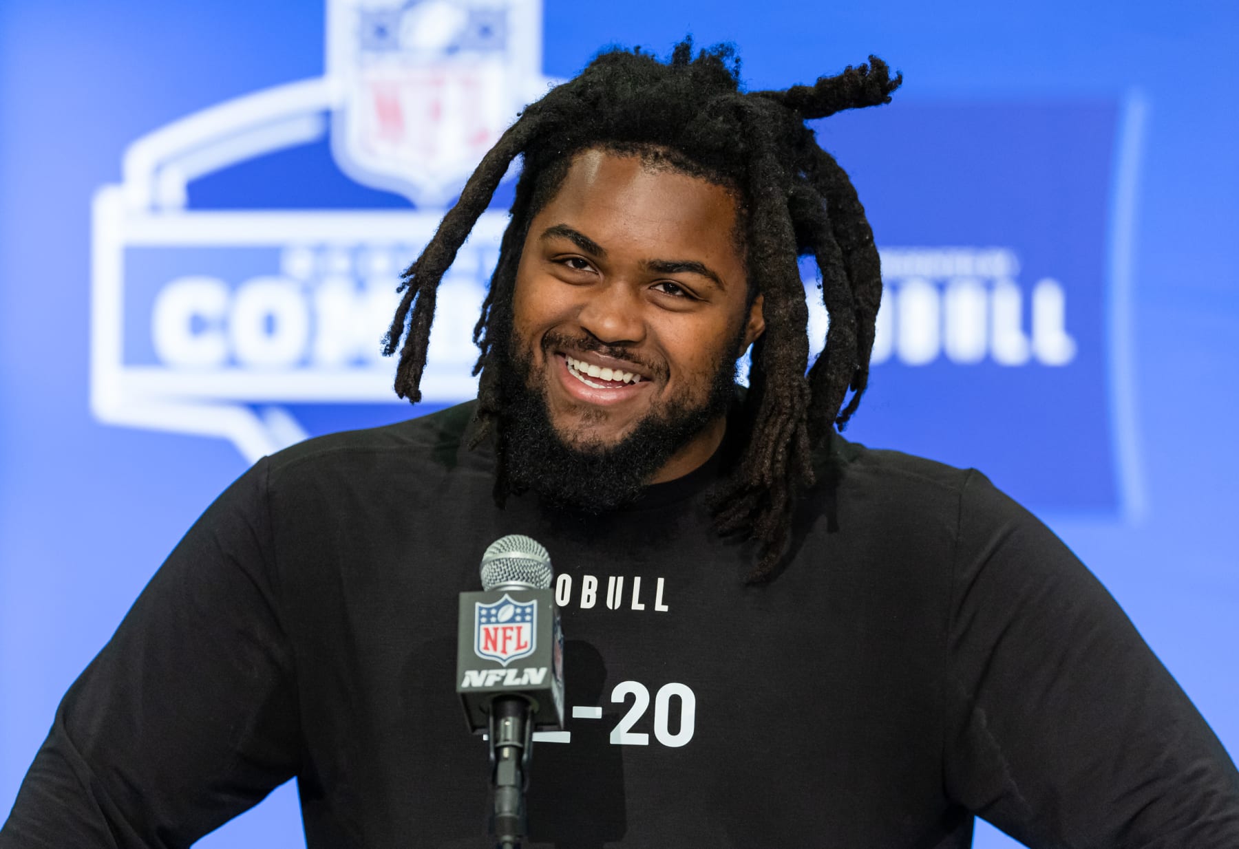 INDIANAPOLIS, INDIANA - FEBRUARY 28: Johnny Newton #DL20 of the Illinois Fighting Illini speaks to the media during the 2024 NFL Draft Combine at Lucas Oil Stadium on February 28, 2024 in Indianapolis, Indiana. (Photo by Michael Hickey/Getty Images)