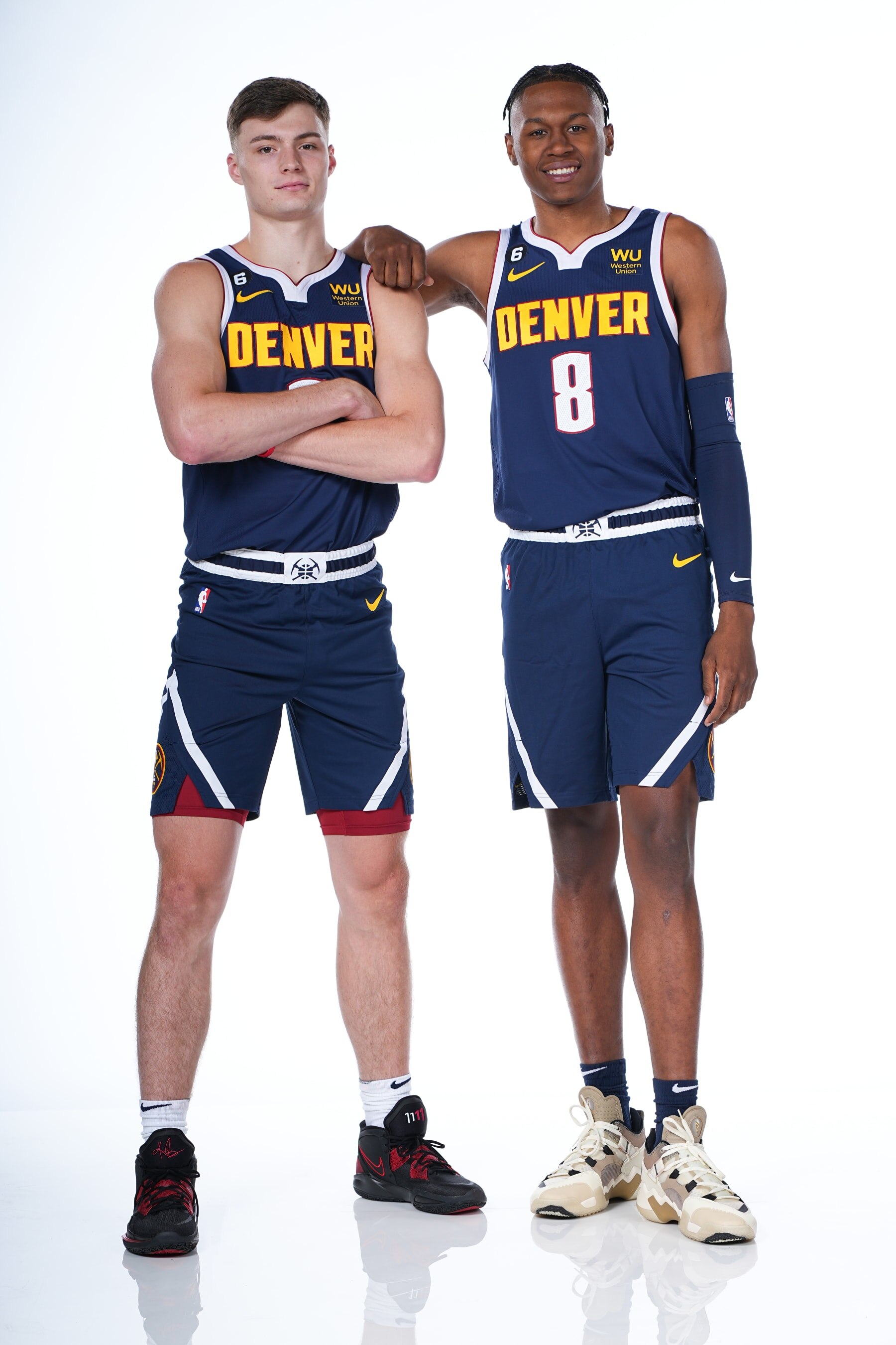 DENVER, CO - SEPTEMBER 26: Christian Braun #0 and Peyton Watson #8 of the Denver Nuggets pose for a portrait during NBA Media Day on September 26, 2022 at the Ball Arena in Denver, Colorado. NOTE TO USER: User expressly acknowledges and agrees that, by downloading and/or using this Photograph, user is consenting to the terms and conditions of the Getty Images License Agreement. Mandatory Copyright Notice: Copyright 2022 NBAE (Photo by Garrett Ellwood/NBAE via Getty Images)