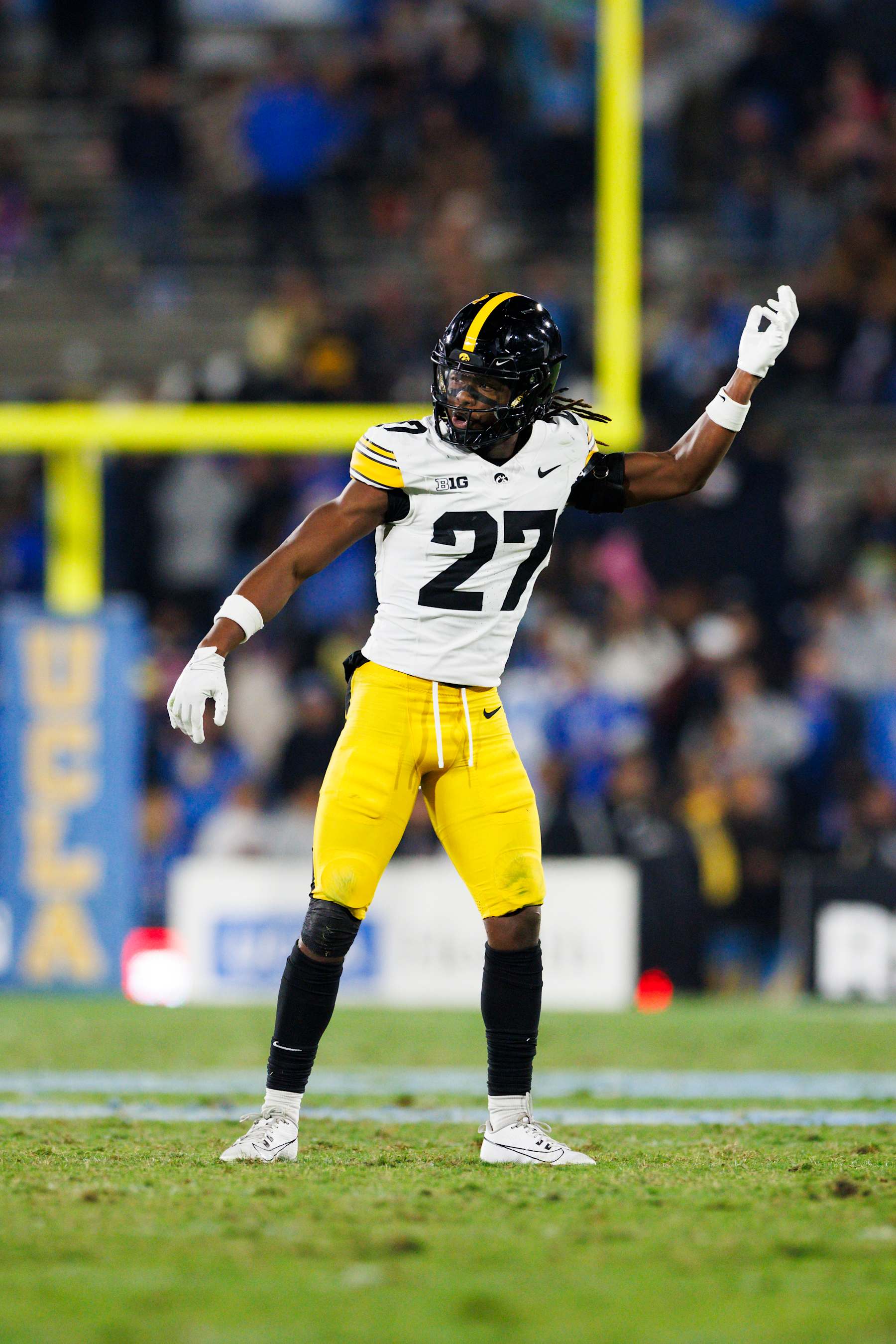 PASADENA, CALIFORNIA - NOVEMBER 8: Jermari Harris #27 of the Iowa Hawkeyes signals during the second half game against UCLA Bruins at Rose Bowl Stadium on November 8, 2024 in Pasadena, California. (Photo by Ric Tapia/Getty Images)