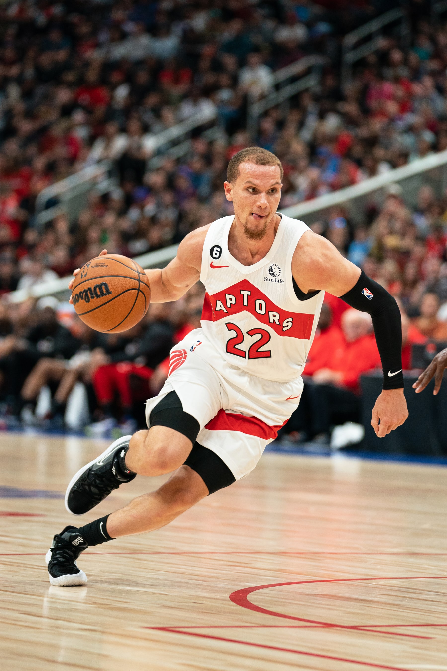 TORONTO, CANADA - OCTOBER 2: Malachi Flynn #22 of the Toronto Raptors handles the ball during the game against the Utah Jazz on October 2, 2022 at Rogers Place in Edmonton, Alberta, Canada.  NOTE TO USER: User expressly acknowledges and agrees that, by downloading and or using this Photograph, user is consenting to the terms and conditions of the Getty Images License Agreement.  Mandatory Copyright Notice: Copyright 2022 NBAE (Photo by Jordan Jones/NBAE via Getty Images)