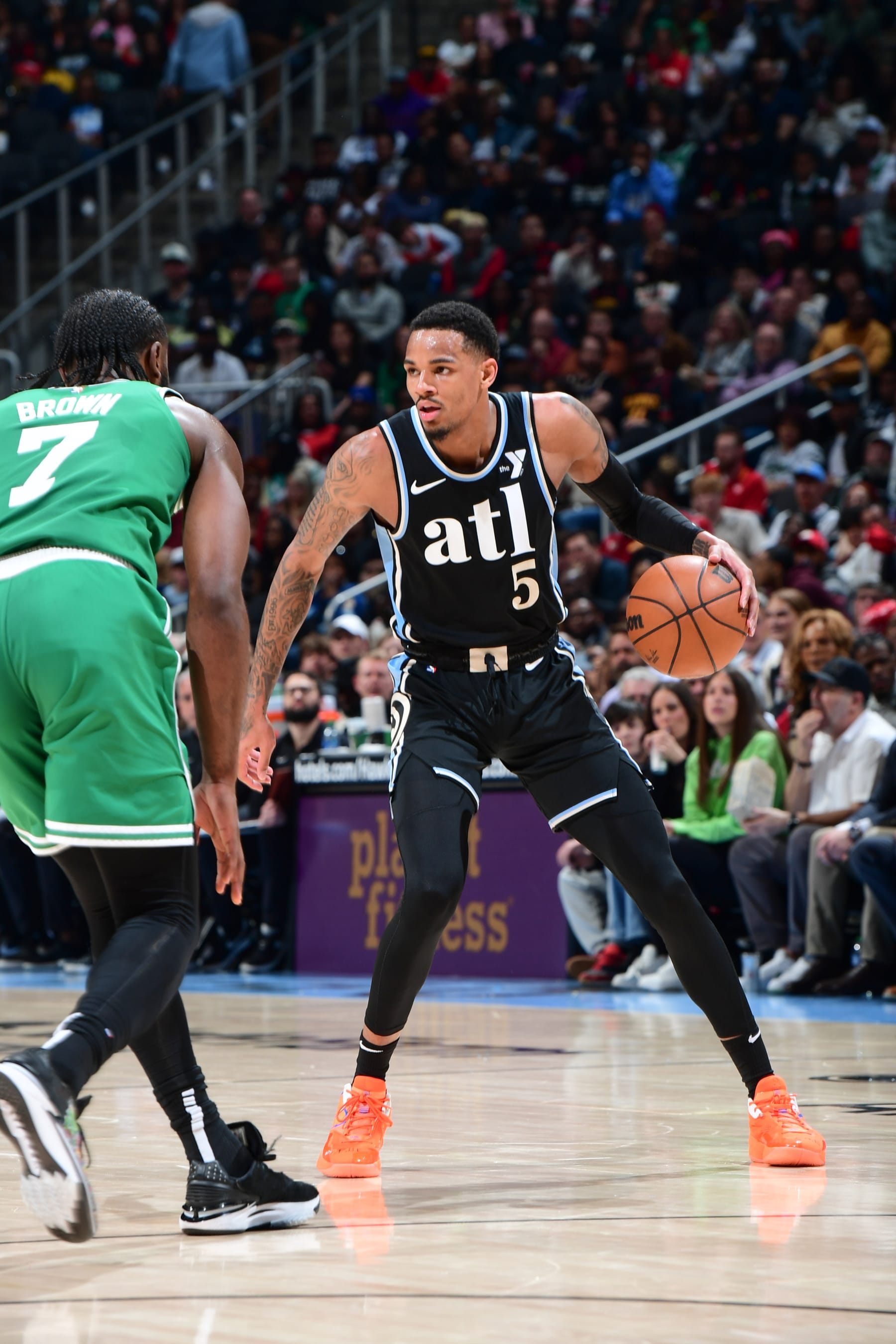 ATLANTA, GA - MARCH 25: Dejounte Murray #5 of the Atlanta Hawks handles the ball during the game on March 25, 2024 at State Farm Arena in Atlanta, Georgia.  NOTE TO USER: User expressly acknowledges and agrees that, by downloading and/or using this Photograph, user is consenting to the terms and conditions of the Getty Images License Agreement. Mandatory Copyright Notice: Copyright 2024 NBAE (Photo by Scott Cunningham/NBAE via Getty Images)