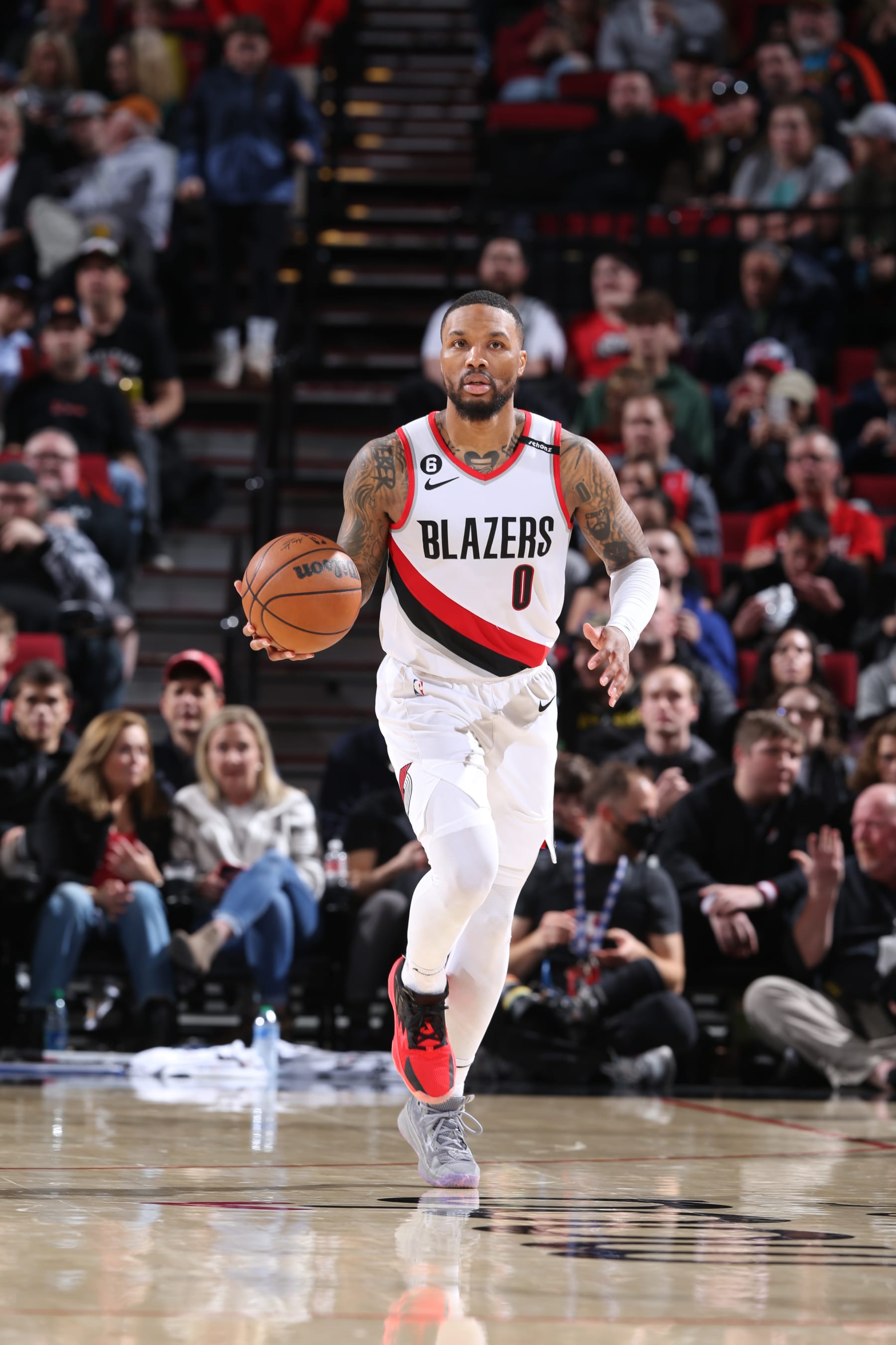 PORTLAND, OR - MARCH 19: Damian Lillard #0 of the Portland Trail Blazers dribbles the ball up the court during the game against the LA Clippers on March 19, 2023 at the Moda Center Arena in Portland, Oregon. NOTE TO USER: User expressly acknowledges and agrees that, by downloading and or using this photograph, user is consenting to the terms and conditions of the Getty Images License Agreement. Mandatory Copyright Notice: Copyright 2023 NBAE (Photo by Sam Forencich/NBAE via Getty Images)