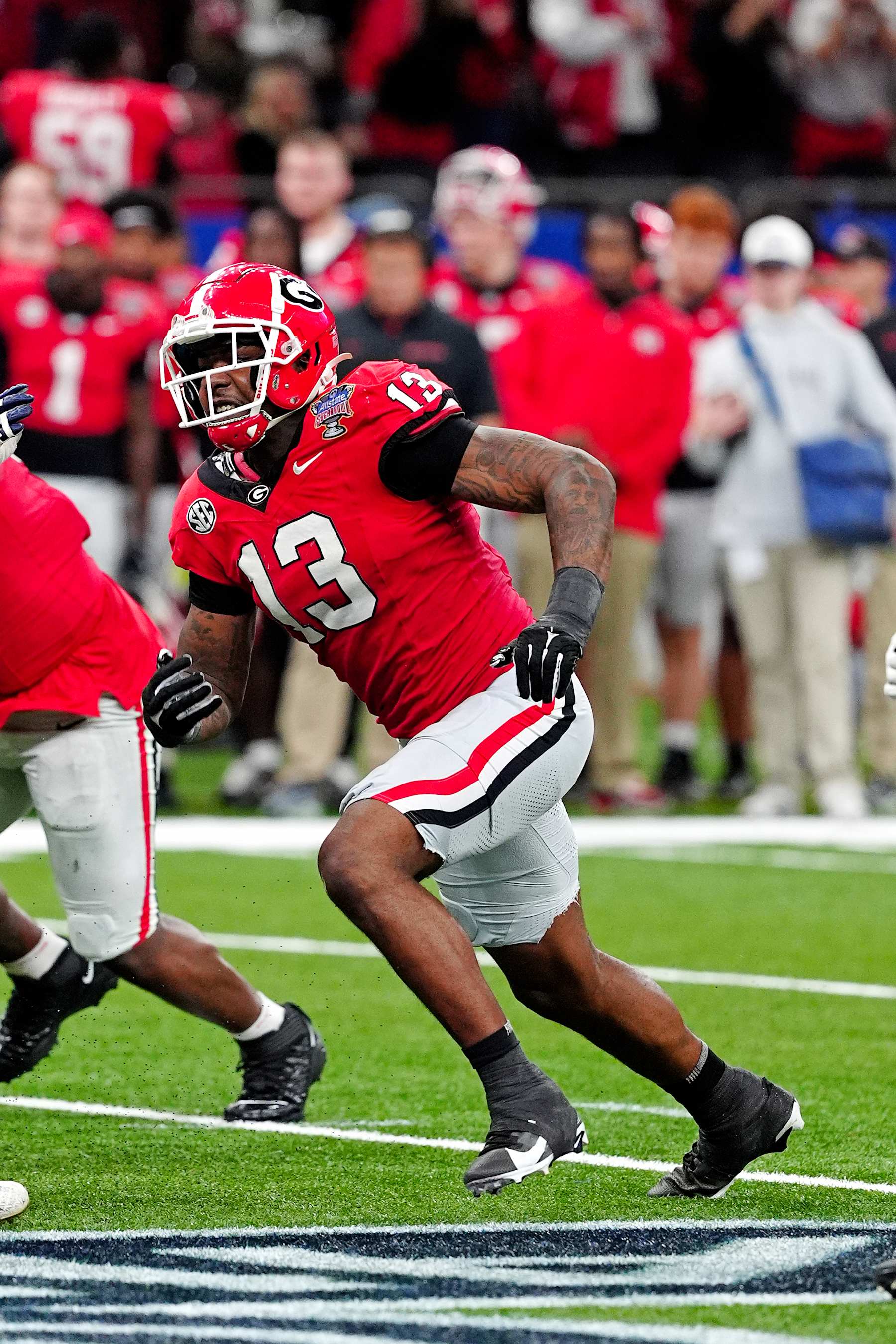 NEW ORLEANS, LA - JANUARY 02: Mykel Williams defensive lineman #13 of the Georgia Bulldogs plays defense during the Notre Dame Fighting Irish versus the Georgia Bulldogs College Football Playoff Quarterfinal at the Allstate Sugar Bowl at the Caesars Superdome in New Orleans, Louisiana. (Photo by Brian Spurlock/Icon Sportswire via Getty Images)