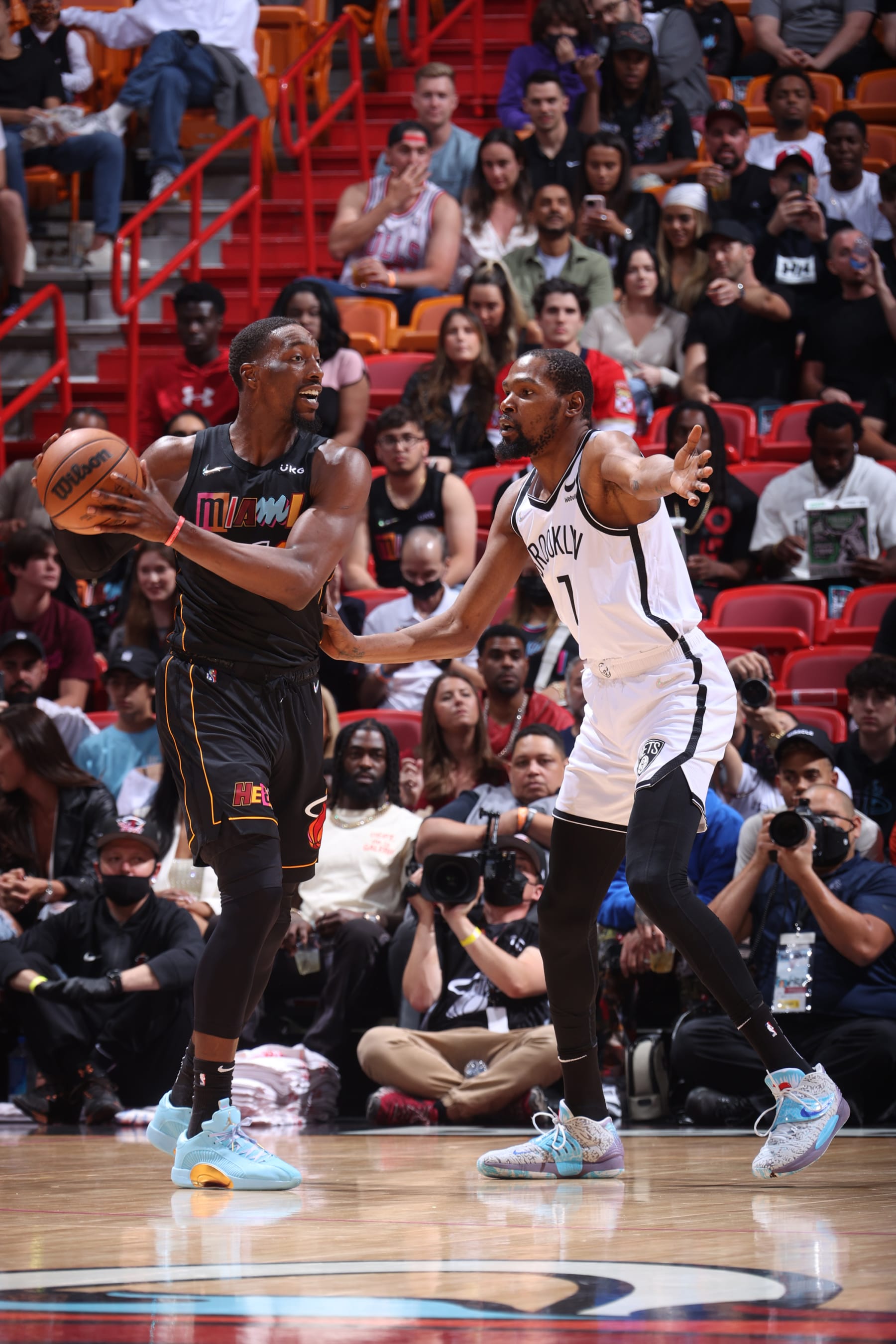 MIAMI, FL - MARCH 26: Kevin Durant #7 of the Brooklyn Nets plays defense on Bam Adebayo #13 of the Miami Heat during the game on March 26, 2022 at FTX Arena in Miami, Florida. NOTE TO USER: User expressly acknowledges and agrees that, by downloading and or using this Photograph, user is consenting to the terms and conditions of the Getty Images License Agreement. Mandatory Copyright Notice: Copyright 2022 NBAE (Photo by Nathaniel S. Butler/NBAE via Getty Images)