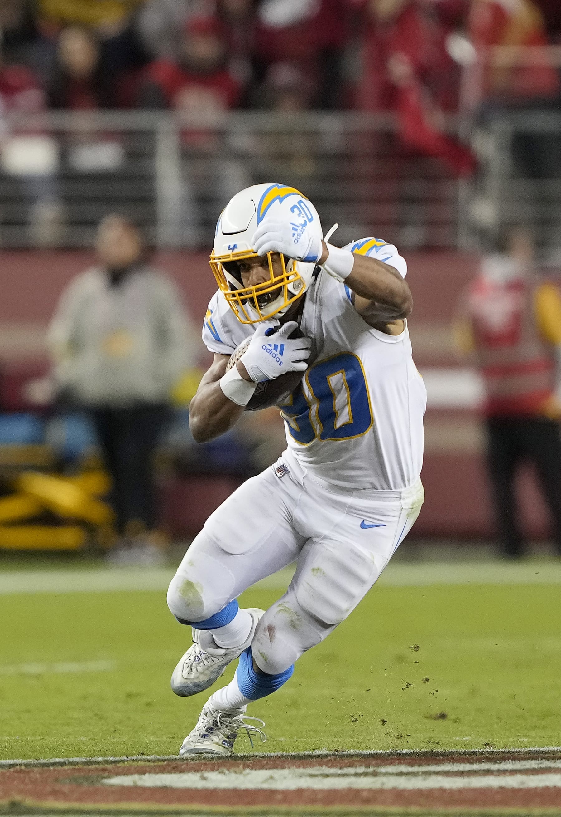 SANTA CLARA, CALIFORNIA - NOVEMBER 13: Austin Ekeler #30 of the Los Angeles Chargers rushes during the third quarter against the San Francisco 49ers at Levi's Stadium on November 13, 2022 in Santa Clara, California. (Photo by Thearon W. Henderson/Getty Images)