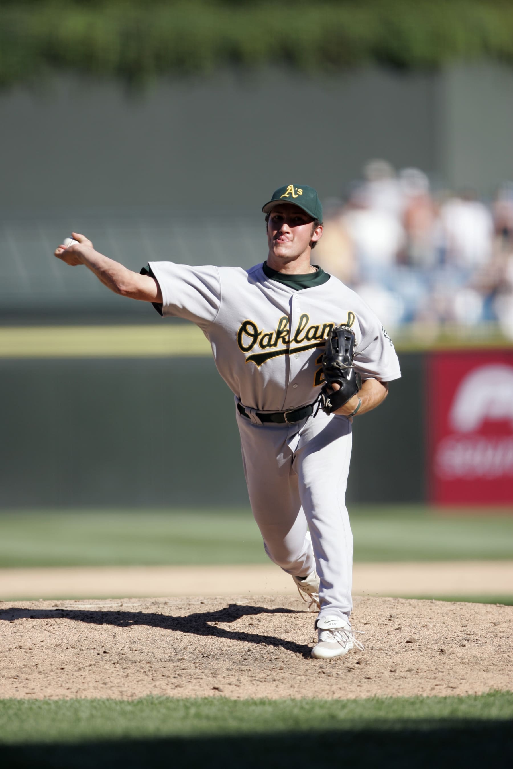 CHICAGO - JULY 10:  Huston Street #20 of the Oakland Athletics delivers a pitch during the game against the Chicago White Sox at U.S. Cellular Field on July 10, 2005 in Chicago, Illinois. The Athletics defeated the White Sox 9-8 in 11 innings. (Photo by Ron Vesely/MLB Photos via Getty Images)