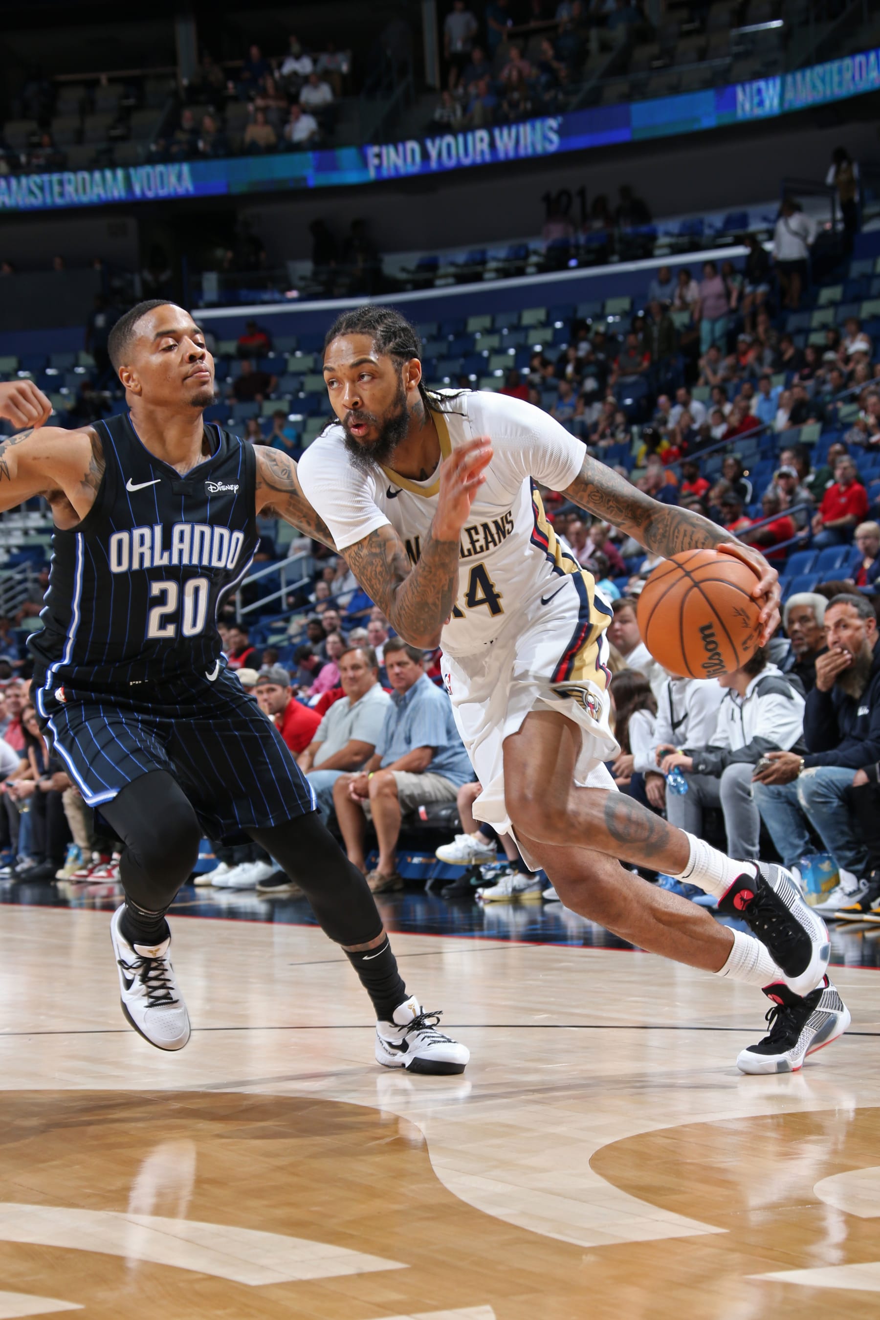 NEW ORLEANS, LA - OCTOBER 10: Brandon Ingram #14 of the New Orleans Pelicans drives to the basket during the game against the Orlando Magic on October 10, 2023 at the Smoothie King Center in New Orleans, Louisiana. NOTE TO USER: User expressly acknowledges and agrees that, by downloading and or using this Photograph, user is consenting to the terms and conditions of the Getty Images License Agreement. Mandatory Copyright Notice: Copyright 2023 NBAE (Photo by Layne Murdoch Jr./NBAE via Getty Images)