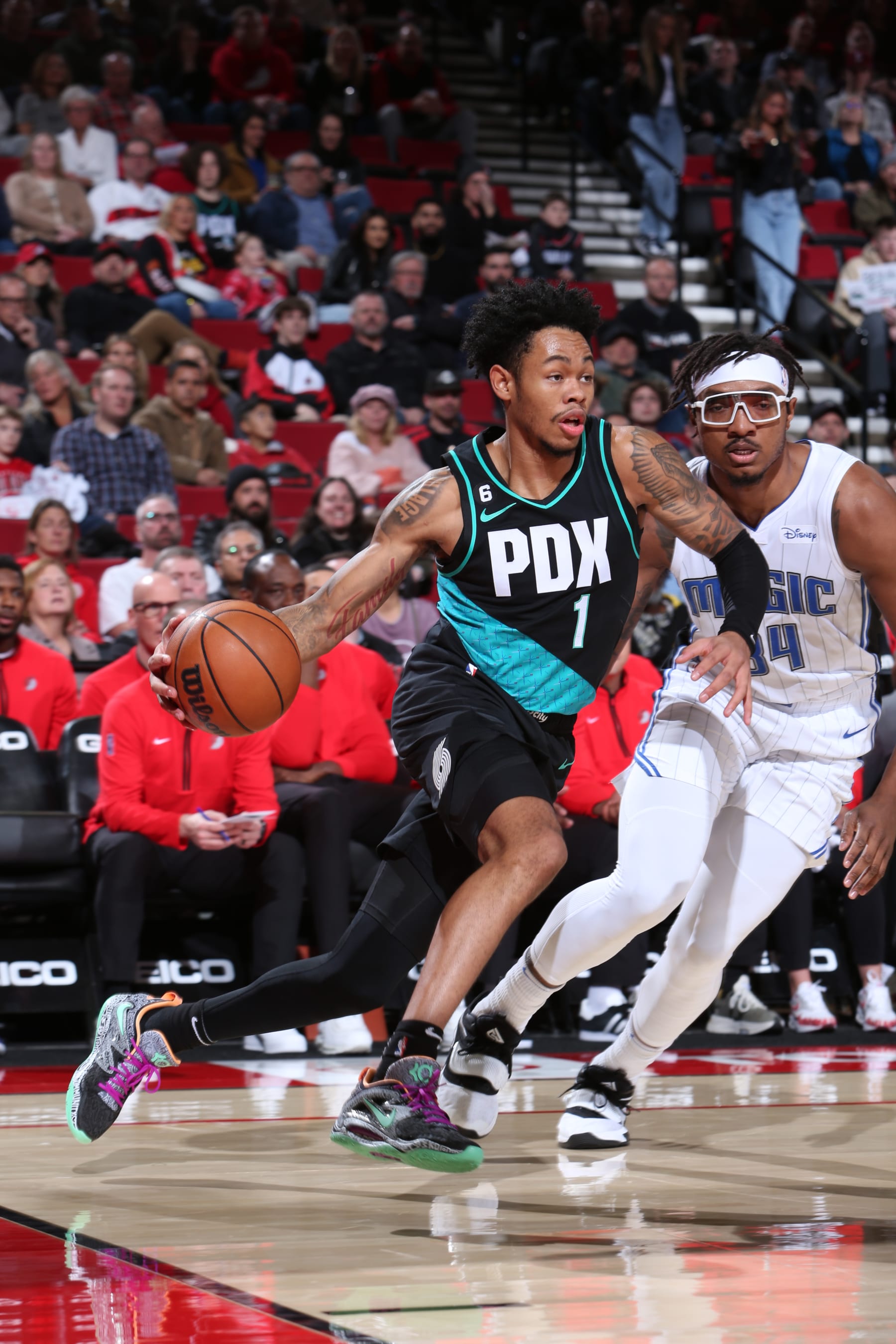 PORTLAND, OR - JANUARY 10: Anfernee Simons #1 of the Portland Trail Blazers drives to the basket during the game against the Orlando Magic on January 10, 2023 at the Moda Center Arena in Portland, Oregon. NOTE TO USER: User expressly acknowledges and agrees that, by downloading and or using this photograph, user is consenting to the terms and conditions of the Getty Images License Agreement. Mandatory Copyright Notice: Copyright 2023 NBAE (Photo by Sam Forencich/NBAE via Getty Images)