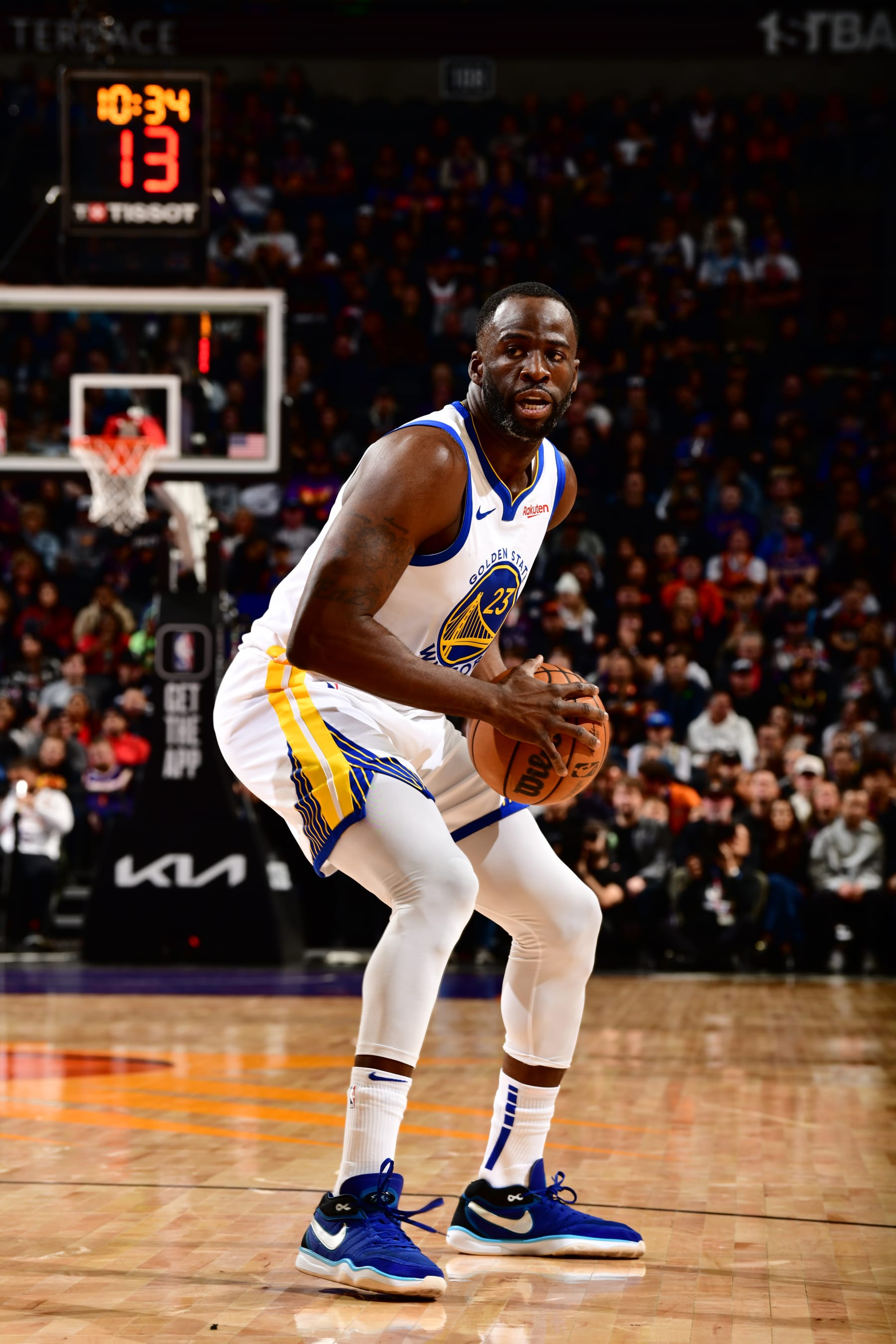 PHOENIX, AZ - DECEMBER 12: Draymond Green #23 of the Golden State Warriors handles the ball during the game against the Phoenix Suns on December 12, 2023 at Footprint Center in Phoenix, Arizona. NOTE TO USER: User expressly acknowledges and agrees that, by downloading and or using this photograph, user is consenting to the terms and conditions of the Getty Images License Agreement. Mandatory Copyright Notice: Copyright 2023 NBAE (Photo by Barry Gossage/NBAE via Getty Images)