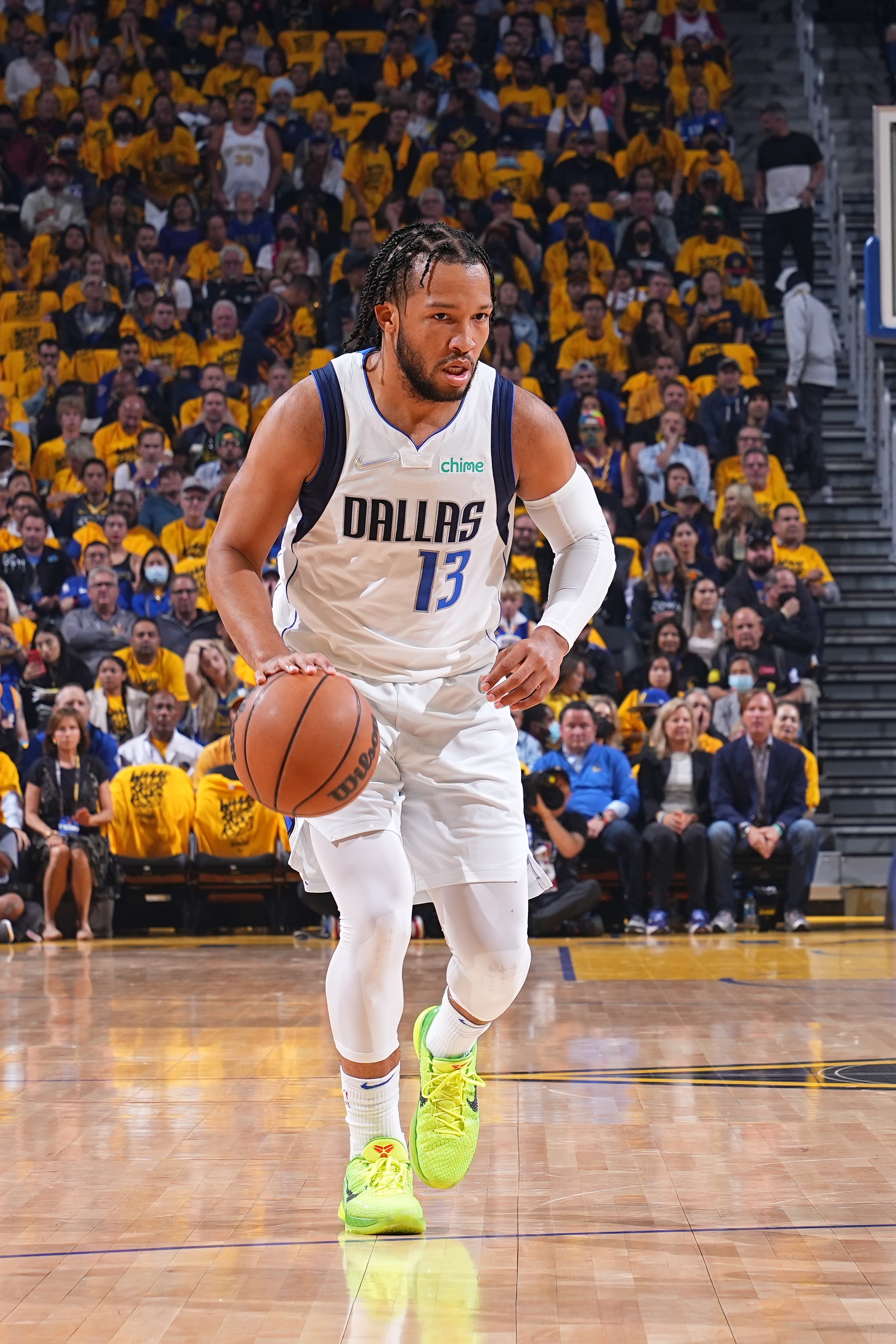 SAN FRANCISCO, CA - MAY 26: Jalen Brunson #13 of the Dallas Mavericks dribbles the ball against the Golden State Warriors during Game 5 of the 2022 NBA Playoffs Western Conference Finals on May 26, 2022 at Chase Center in San Francisco, California. NOTE TO USER: User expressly acknowledges and agrees that, by downloading and or using this photograph, user is consenting to the terms and conditions of Getty Images License Agreement. Mandatory Copyright Notice: Copyright 2022 NBAE (Photo by Garrett Ellwood/NBAE via Getty Images)