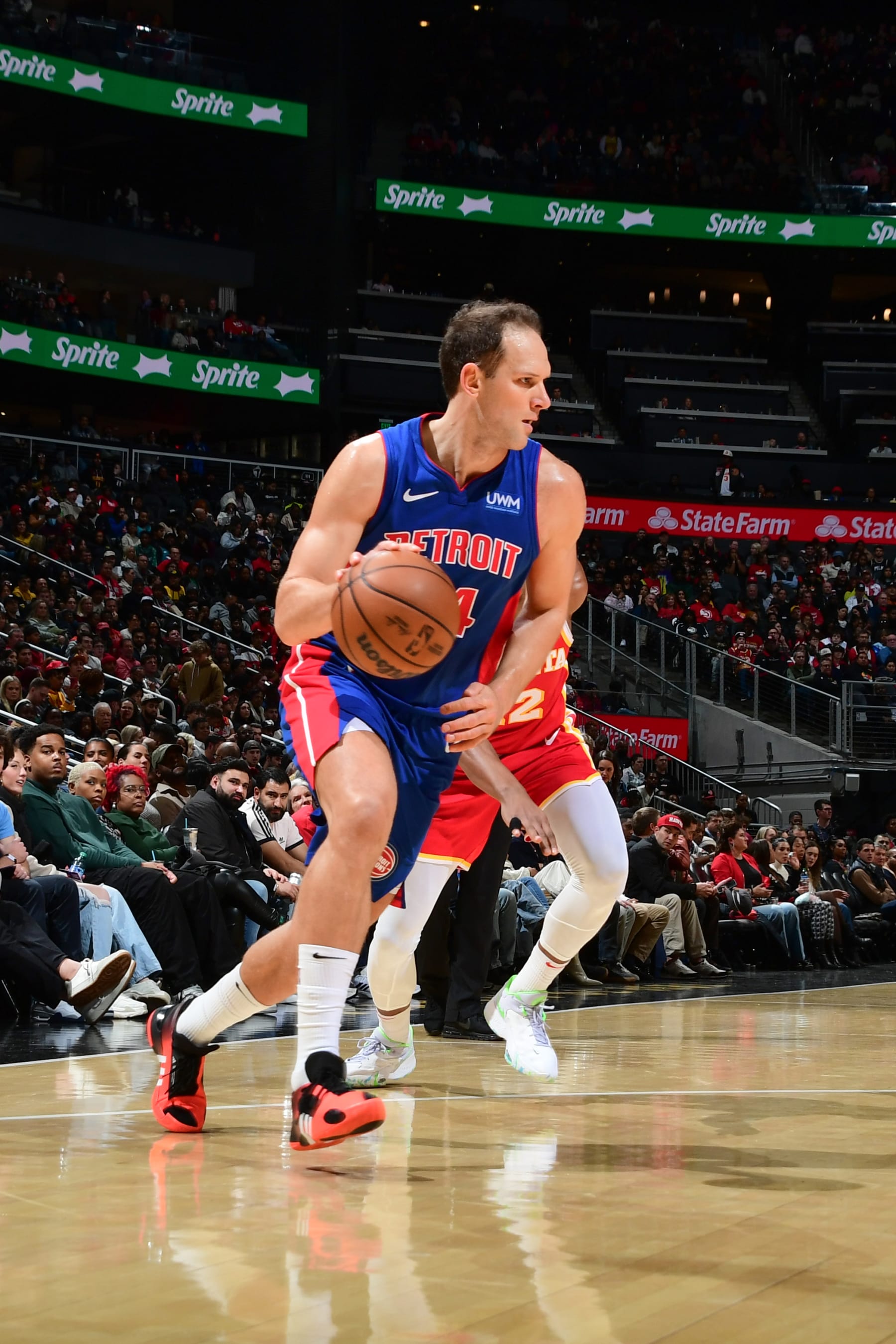 ATLANTA, GA - DECEMBER 18: Bojan Bogdanovic #44 of the Detroit Pistons goes to the basket during the game on December 18, 2023 at State Farm Arena in Atlanta, Georgia.  NOTE TO USER: User expressly acknowledges and agrees that, by downloading and/or using this Photograph, user is consenting to the terms and conditions of the Getty Images License Agreement. Mandatory Copyright Notice: Copyright 2023 NBAE (Photo by Scott Cunningham/NBAE via Getty Images)