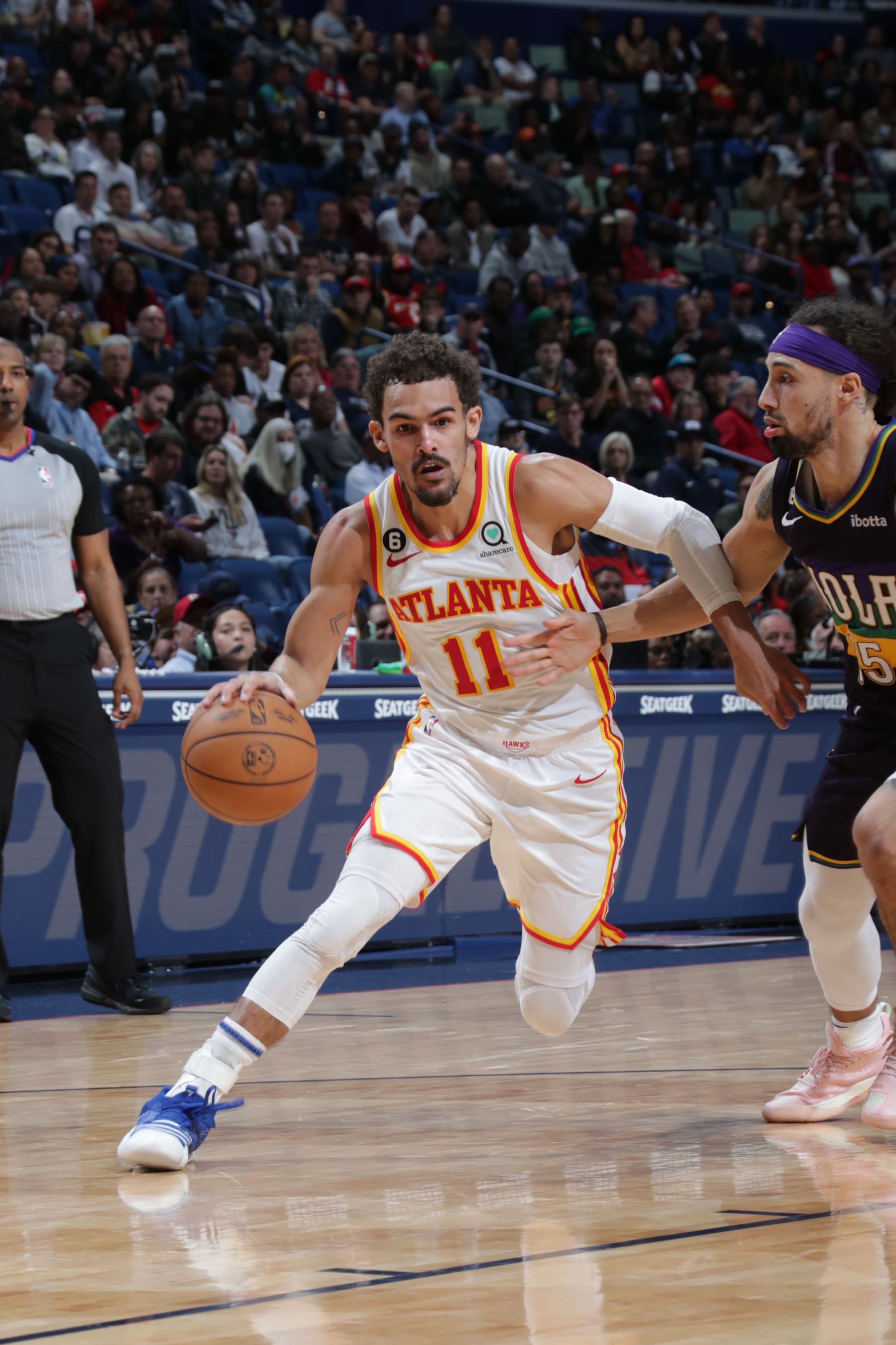 NEW ORLEANS, LA - FEBRUARY 7: Trae Young #11 of the Atlanta Hawks drives to the basket during the game against the New Orleans Pelicans on February 7, 2023 at the Smoothie King Center in New Orleans, Louisiana. NOTE TO USER: User expressly acknowledges and agrees that, by downloading and or using this Photograph, user is consenting to the terms and conditions of the Getty Images License Agreement. Mandatory Copyright Notice: Copyright 2023 NBAE (Photo by Layne Murdoch Jr./NBAE via Getty Images)