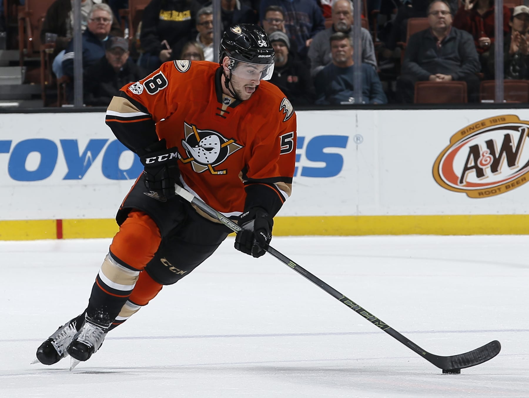 ANAHEIM, CA - FEBRUARY 22:  Nicolas Kerdiles #58 of the Anaheim Ducks handles the puck during his NHL debut against the Boston Bruins on February 22, 2017 at Honda Center in Anaheim, California. (Photo by Debora Robinson/NHLI via Getty Images) *** Local Caption *