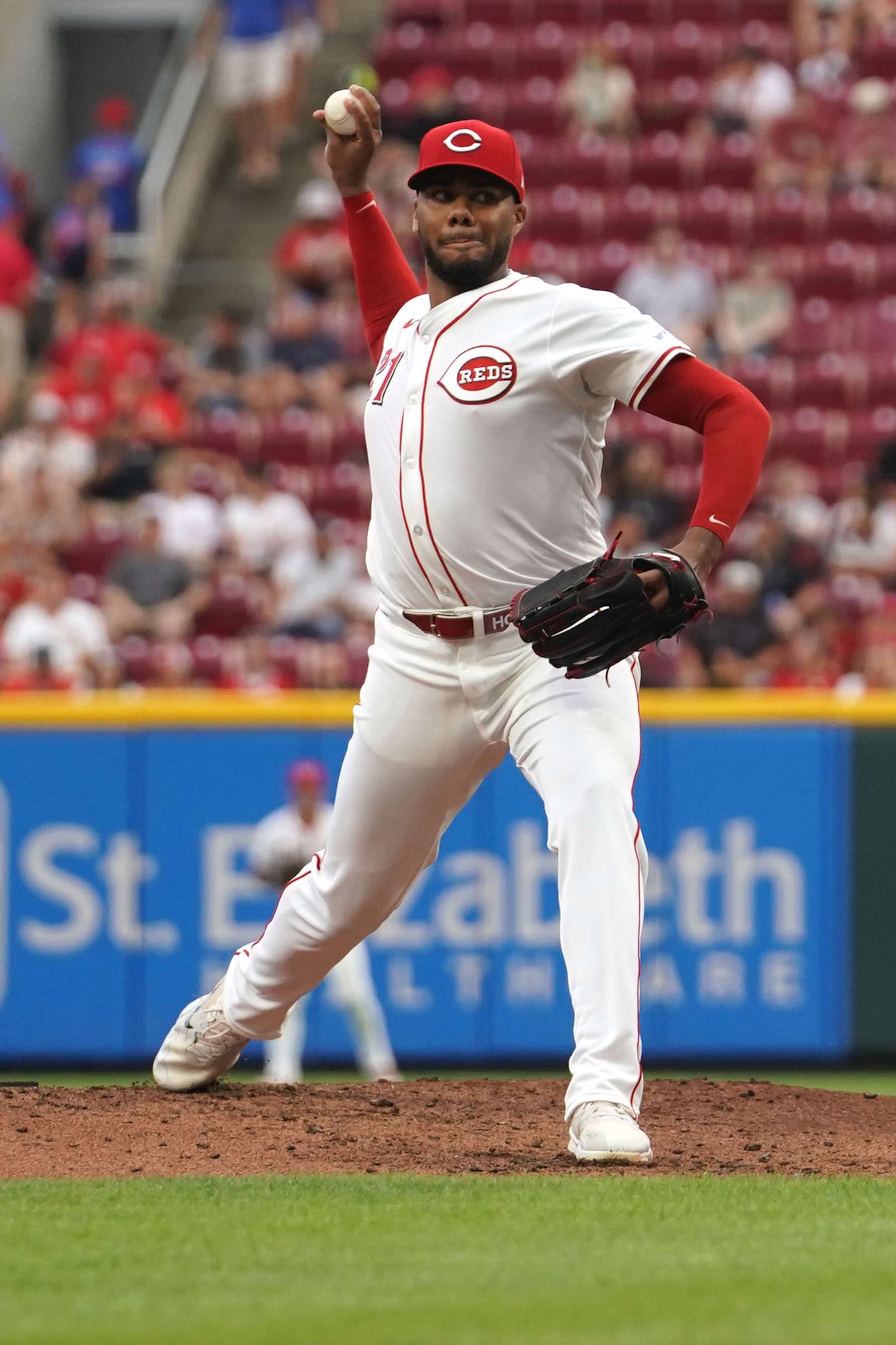 CINCINNATI, OHIO - AUGUST 13: Hunter Greene #21 of the Cincinnati Reds pitches during the game against the St. Louis Cardinals at Great American Ball Park on August 13, 2024 in Cincinnati, Ohio. (Photo by Jason Mowry/Getty Images)