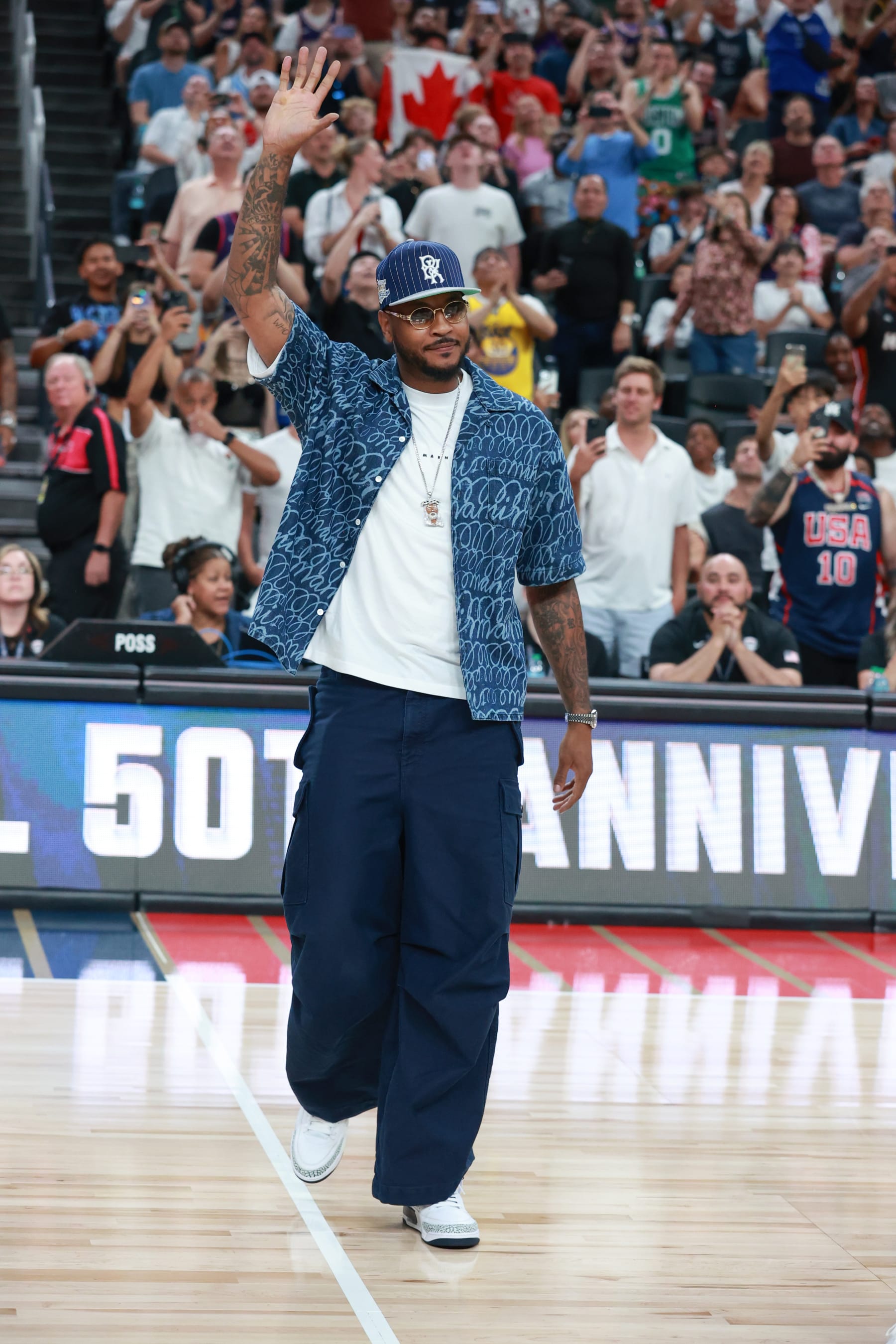 LAS VEGAS, NV - JULY 10:  Carmelo Anthony looks on during the game between Team USA and Team Canada on July 10, 2024 at the T-Mobile Arena in Las Vegas, Nevada. NOTE TO USER: User expressly acknowledges and agrees that, by downloading and/or using this Photograph, user is consenting to the terms and conditions of the Getty Images License Agreement. Mandatory Copyright Notice: Copyright 2024 NBAE (Photo by Nathaniel S. Butler/NBAE via Getty Images)