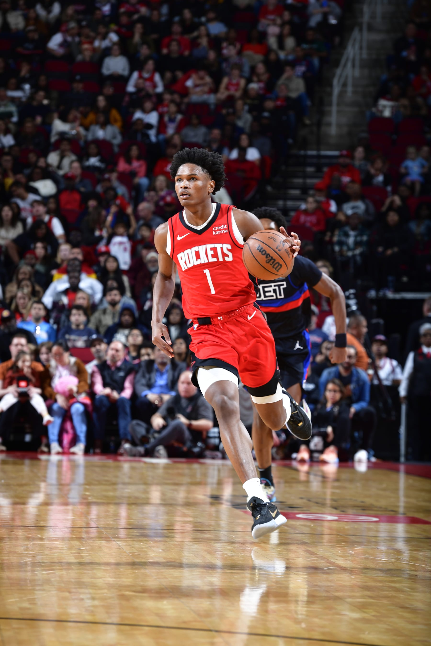 HOUSTON, TX - JANUARY 1: Amen Thompson #1 of the Houston Rockets dribbles the ball during the game against the Detroit Pistons on January 1, 2024 at the Toyota Center in Houston, Texas. NOTE TO USER: User expressly acknowledges and agrees that, by downloading and or using this photograph, User is consenting to the terms and conditions of the Getty Images License Agreement. Mandatory Copyright Notice: Copyright 2024 NBAE (Photo by Logan Riely/NBAE via Getty Images)