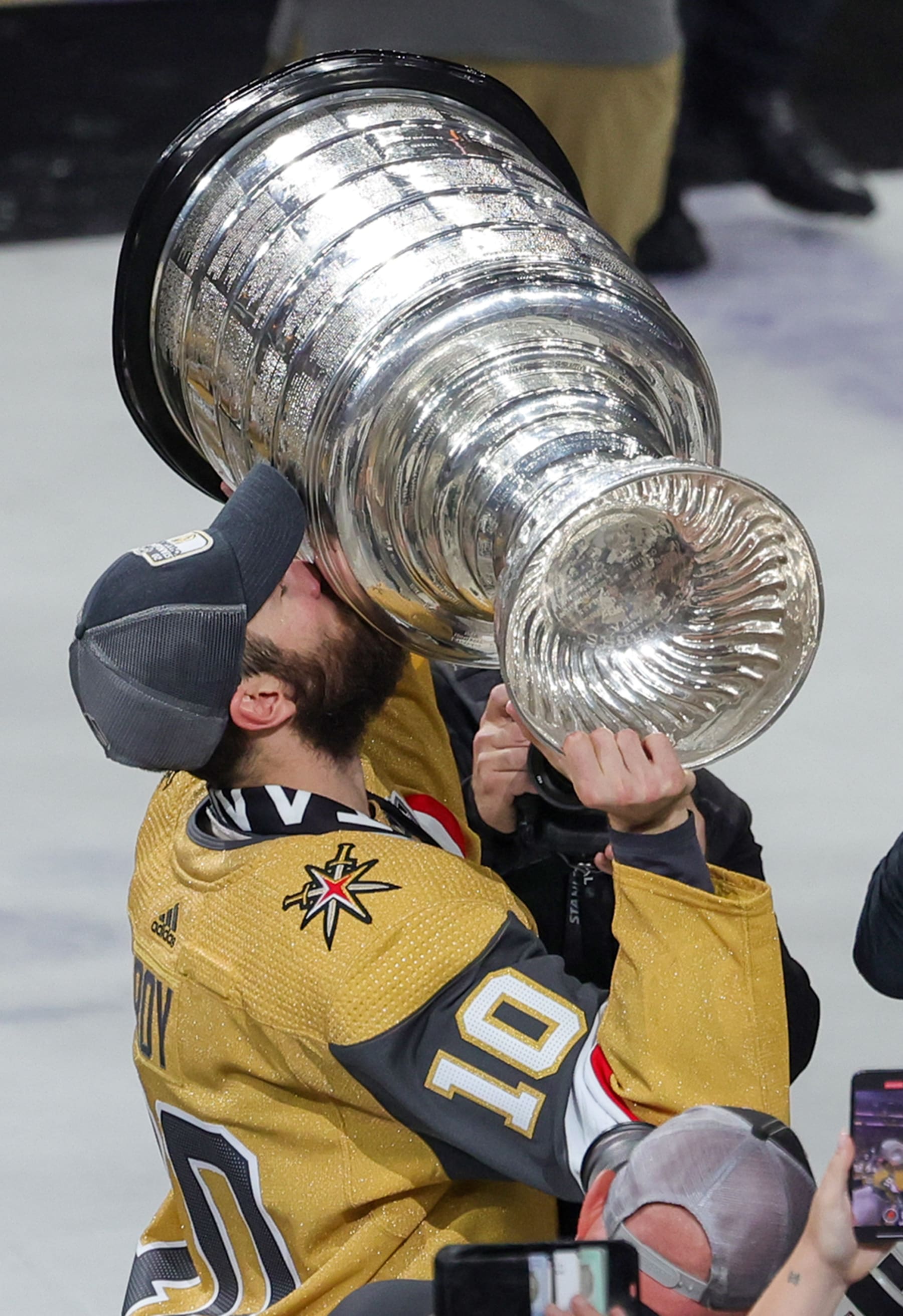 LAS VEGAS, NEVADA - JUNE 13: Nicolas Roy #10 of the Vegas Golden Knights hoists the Stanley Cup after the team's 9-3 victory over the Florida Panthers in Game Five of the 2023 NHL Stanley Cup Final at T-Mobile Arena on June 13, 2023 in Las Vegas, Nevada. The Golden Knights won the series four games to one. (Photo by Ethan Miller/Getty Images)