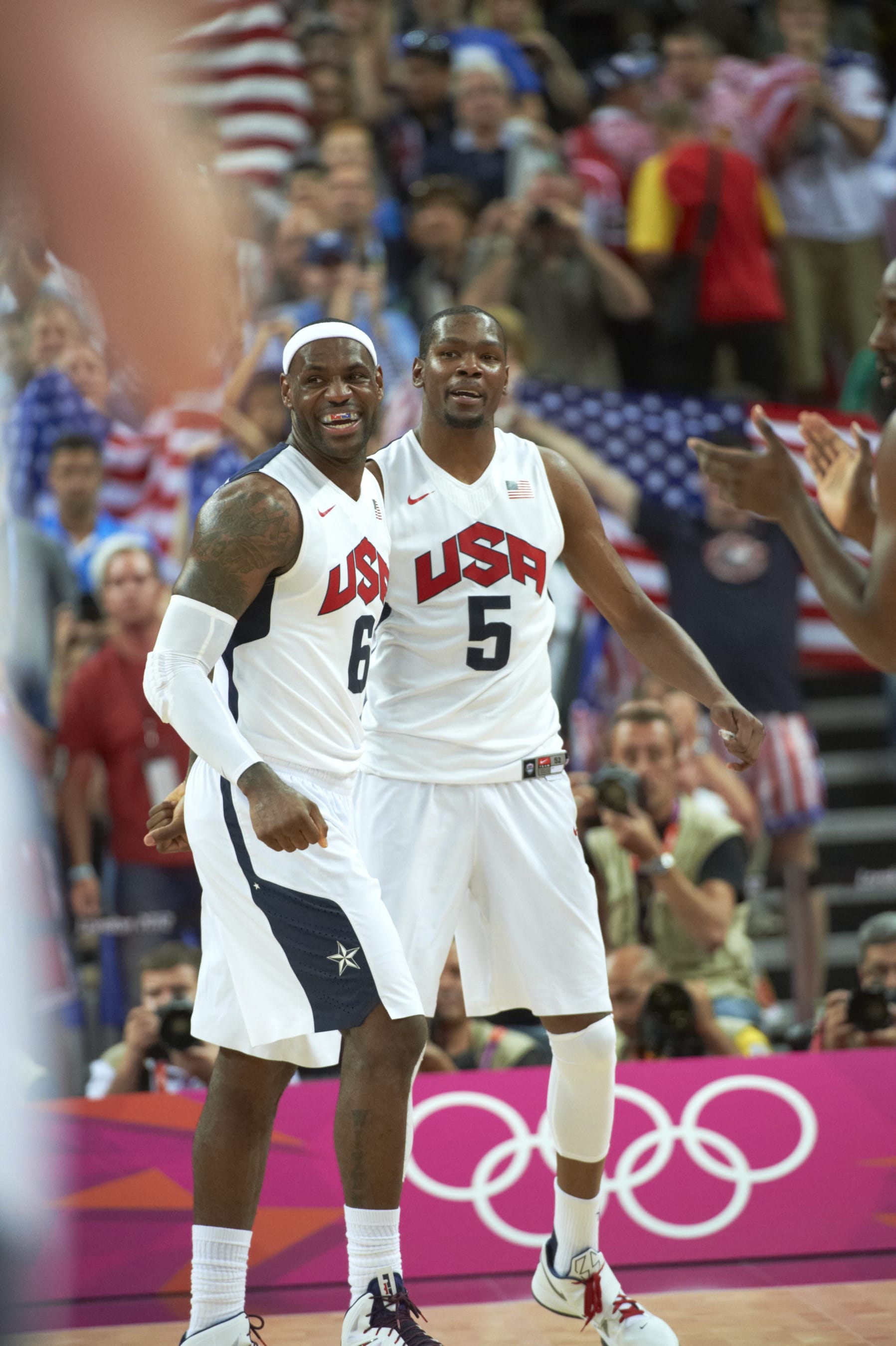 Basketball: 2012 Summer Olympics: USA Kevin Durant (5) and LeBron James (5) victorious after winning Men's Gold Medal Game vs Spain at North Greenwich Arena.
London, United Kingdom 8/12/2012
CREDIT: John Biever (Photo by John Biever /Sports Illustrated via Getty Images)
(Set Number: X155185 TK2 R1 F56 ) Basketball: 2012 Summer Olympics: USA Kevin Durant (5) and LeBron James (5) victorious after winning Men's Gold Medal Game vs Spain at North Greenwich Arena.
London, United Kingdom 8/12/2012
CREDIT: John Biever (Photo by John Biever /Sports Illustrated via Getty Images)
(Set Number: X155185 TK2 R1 F56 )