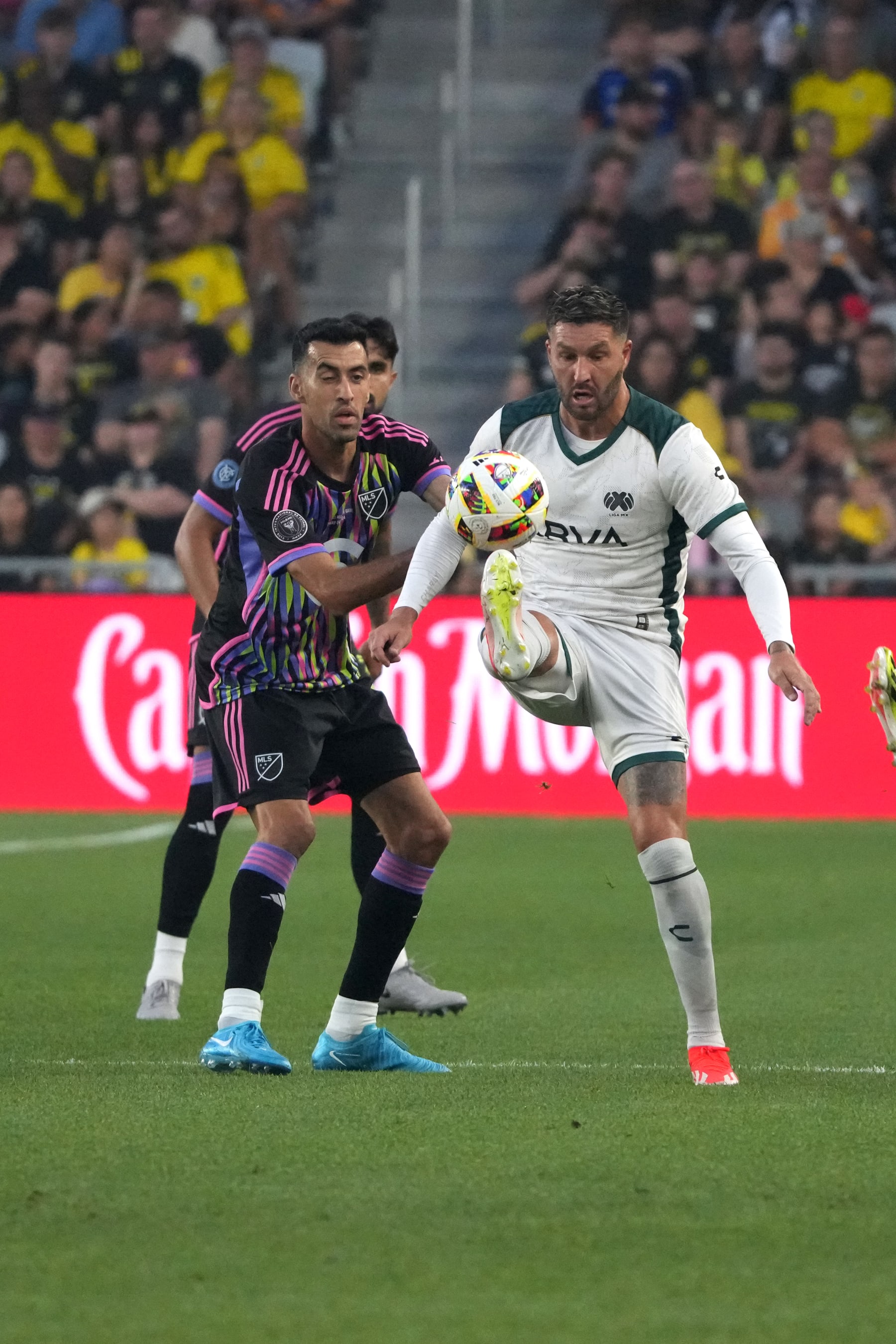 COLUMBUS, OHIO - JULY 24: Andre-Pierre Gignac #9 of the LIGA MX All-Stars controls the ball against Sergio Busquets #5 of the MLS All-Stars during the first half of the 2024 MLS All-Star Game at Lower.com Field on July 24, 2024 in Columbus, Ohio. (Photo by Jason Mowry/Getty Images)