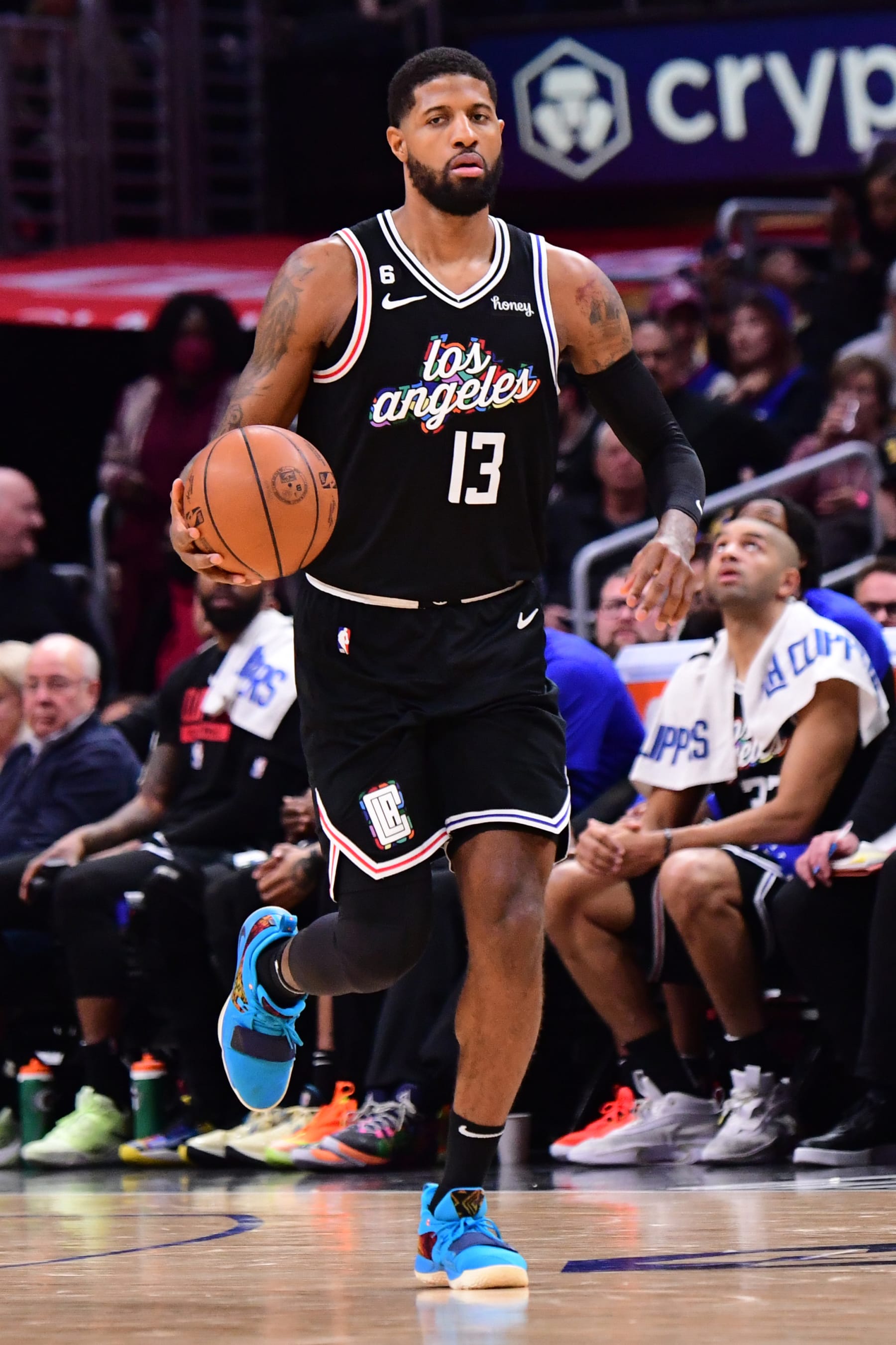 LOS ANGELES, CA - FEBUARY 14:  Paul George #13 of the LA Clippers handles the ball during the game  on Febuary 14, 2023 at Crypto.Com Arena in Los Angeles, California. NOTE TO USER: User expressly acknowledges and agrees that, by downloading and/or using this Photograph, user is consenting to the terms and conditions of the Getty Images License Agreement. Mandatory Copyright Notice: Copyright 2023 NBAE (Photo by Adam Pantozzi/NBAE via Getty Images)