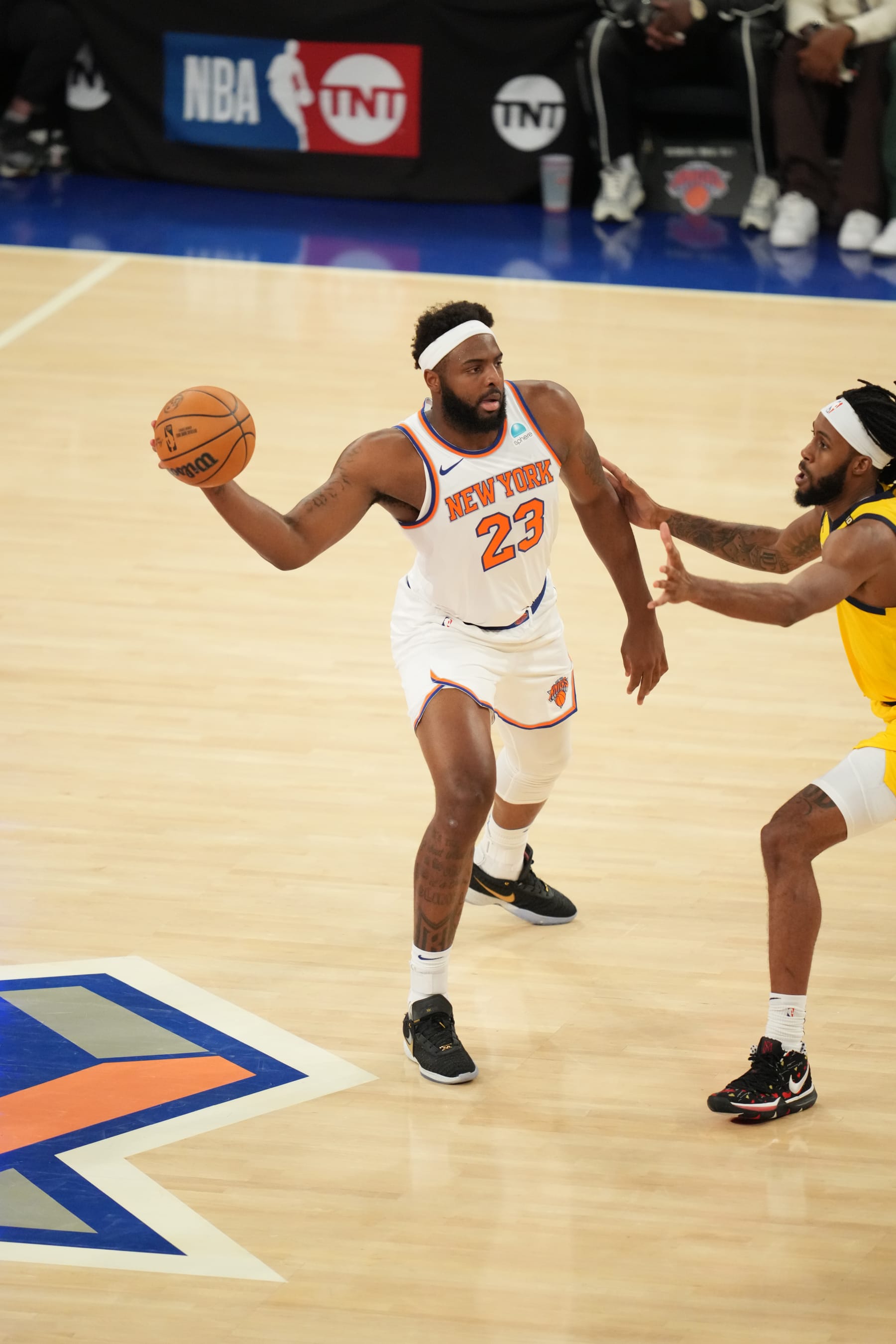 NEW YORK, NY - MAY 6:Mitchell Robinson #23 of the New York Knicks passes the ball during the game against the Indiana Pacers  during Round 2 Game 1 of the 2024 NBA Playoffs on May 6, 2024 at Madison Square Garden in New York City, New York.  NOTE TO USER: User expressly acknowledges and agrees that, by downloading and or using this photograph, User is consenting to the terms and conditions of the Getty Images License Agreement. Mandatory Copyright Notice: Copyright 2024 NBAE  (Photo by Jesse D. Garrabrant/NBAE via Getty Images)