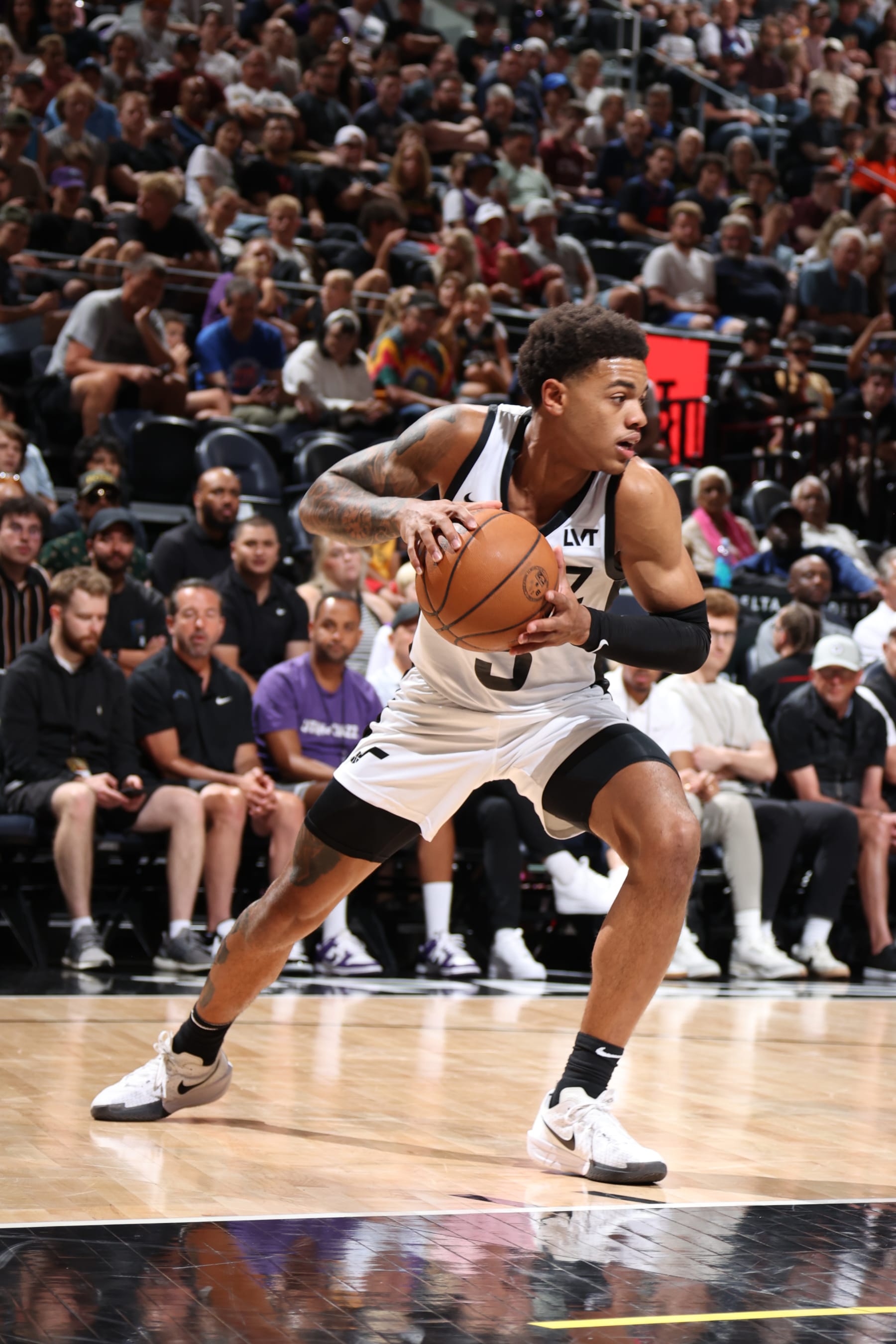 SALT LAKE CITY, UT - July 8: Keyonte George #3 of the Utah Jazz handles the ball during the game against the Memphis Grizzlies during the 2024 NBA Salt Lake City Summer League on July 8, 2024 at Delta Center in Salt Lake City, Utah. NOTE TO USER: User expressly acknowledges and agrees that, by downloading and or using this Photograph, User is consenting to the terms and conditions of the Getty Images License Agreement. Mandatory Copyright Notice: Copyright 2024 NBAE (Photo by Melissa Majchrzak/NBAE via Getty Images)