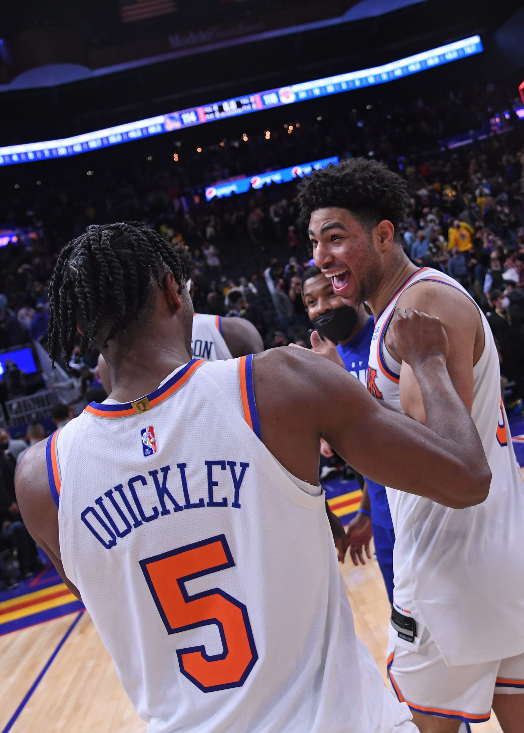 SAN FRANCISCO, CA - FEBRUARY 10: Immanuel Quickley #5 of the New York Knicks and Quentin Grimes #6 smile prior to the game against the Golden State Warriors on FEBRUARY 10, 2022 at Chase Center in San Francisco, California. NOTE TO USER: User expressly acknowledges and agrees that, by downloading and or using this photograph, user is consenting to the terms and conditions of Getty Images License Agreement. Mandatory Copyright Notice: Copyright 2022 NBAE (Photo by Noah Graham/NBAE via Getty Images)