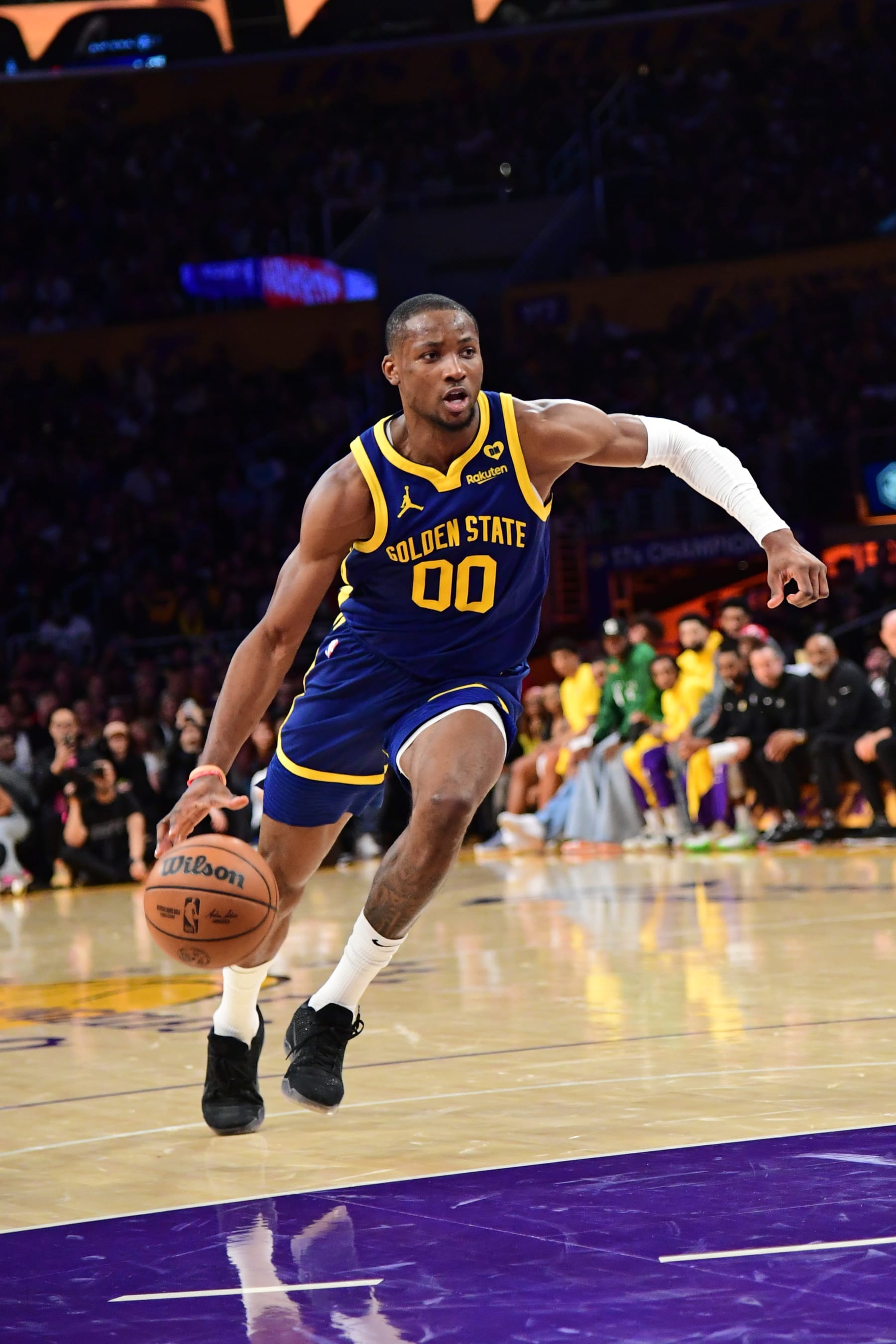 LOS ANGELES, CA - MACH 16: Jonathan Kuminga #00 of the Golden State Warriors dribbles the ball during the game against the Los Angeles Lakers on March 16, 2024 at Crypto.Com Arena in Los Angeles, California. NOTE TO USER: User expressly acknowledges and agrees that, by downloading and/or using this Photograph, user is consenting to the terms and conditions of the Getty Images License Agreement. Mandatory Copyright Notice: Copyright 2024 NBAE (Photo by Adam Pantozzi/NBAE via Getty Images)