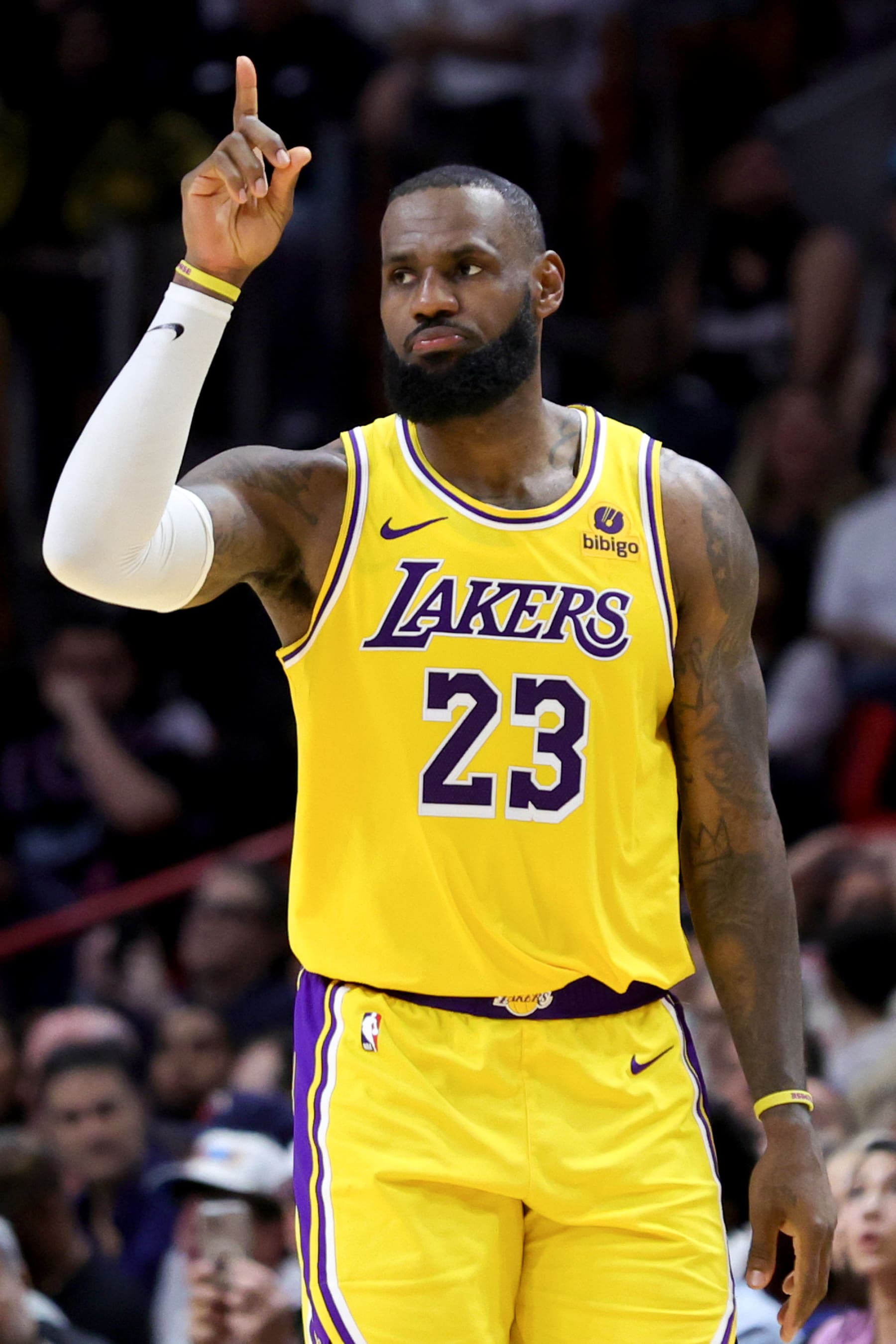 MIAMI, FLORIDA - NOVEMBER 06: LeBron James #23 of the Los Angeles Lakers looks on against the Miami Heat during the third quarter of the game at Kaseya Center on November 06, 2023 in Miami, Florida. NOTE TO USER: User expressly acknowledges and agrees that, by downloading and or using this photograph, User is consenting to the terms and conditions of the Getty Images License Agreement. (Photo by Megan Briggs/Getty Images)