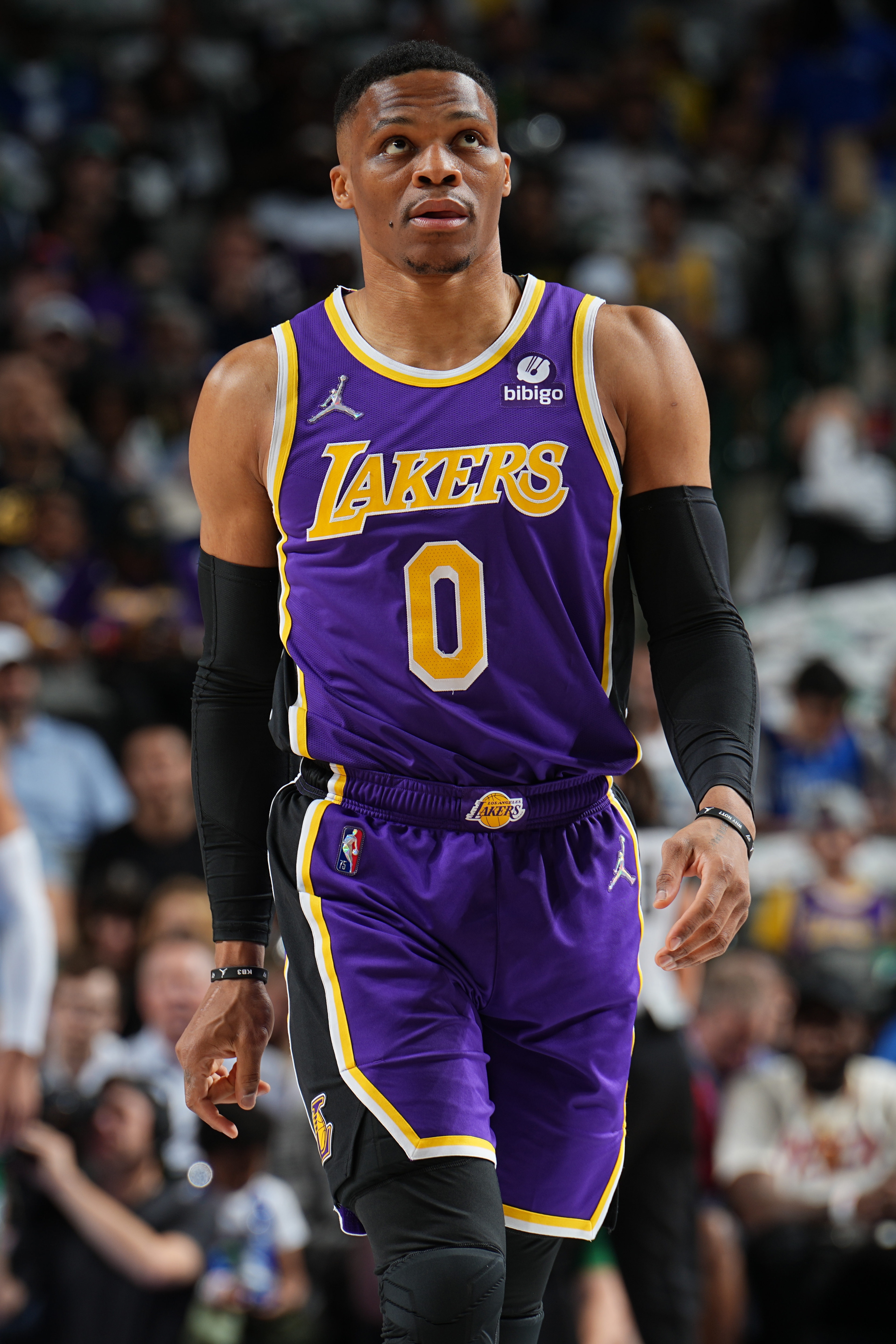 DALLAS, TX - MARCH 29: Russell Westbrook #0 of the Los Angeles Lakers looks on before the game against the Dallas Mavericks on March 29, 2022 at the American Airlines Center in Dallas, Texas. NOTE TO USER: User expressly acknowledges and agrees that, by downloading and or using this photograph, User is consenting to the terms and conditions of the Getty Images License Agreement. Mandatory Copyright Notice: Copyright 2022 NBAE (Photo by Glenn James/NBAE via Getty Images)