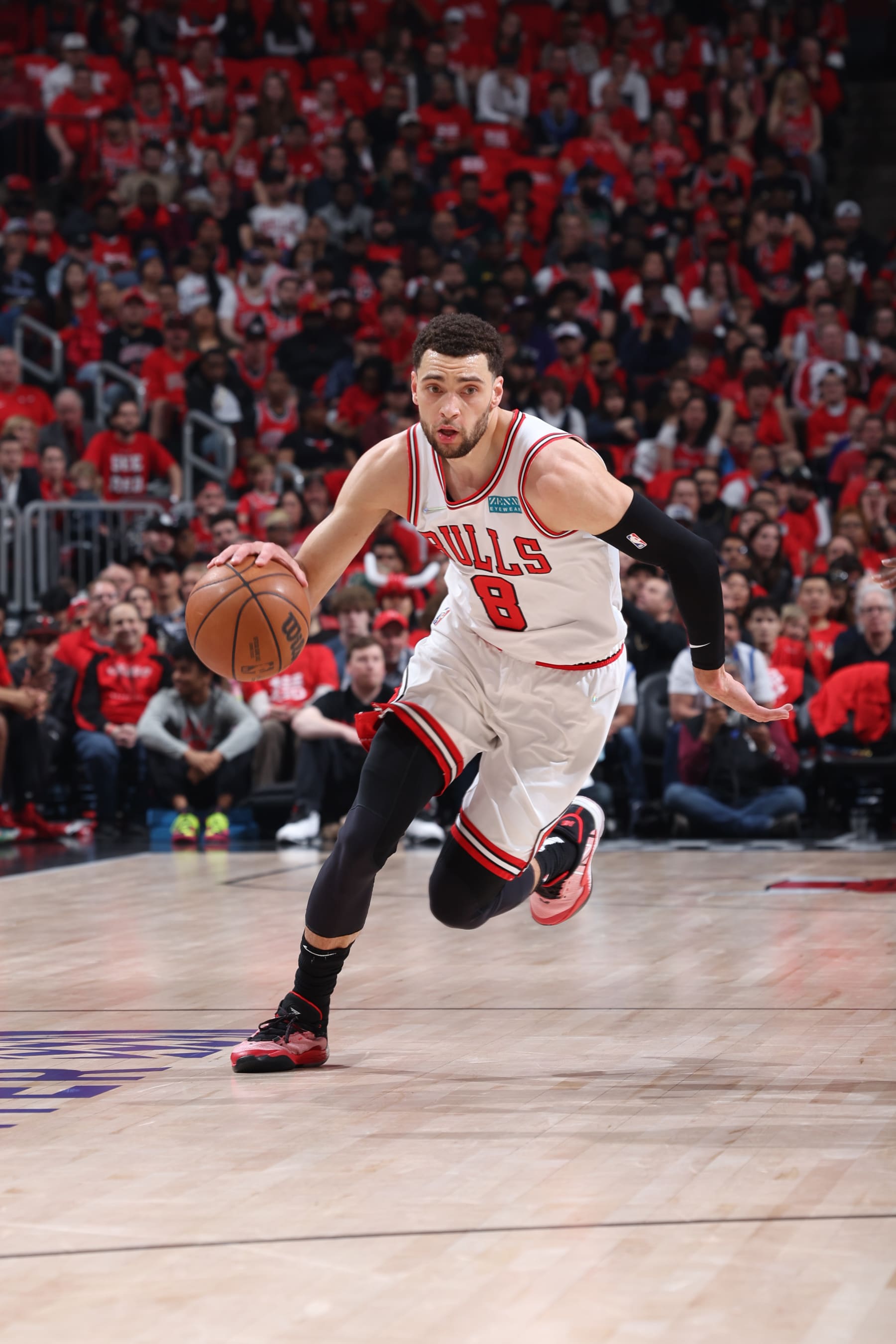 CHICAGO, IL - APRIL 24: Zach LaVine #8 of the Chicago Bulls drives to the basket during the game against the Milwaukee Bucks during Round 1 Game 4 of the 2022 NBA Playoffs on April 24, 2022 at United Center in Chicago, Illinois. NOTE TO USER: User expressly acknowledges and agrees that, by downloading and or using this photograph, User is consenting to the terms and conditions of the Getty Images License Agreement. Mandatory Copyright Notice: Copyright 2022 NBAE (Photo by Jeff Haynes/NBAE via Getty Images)