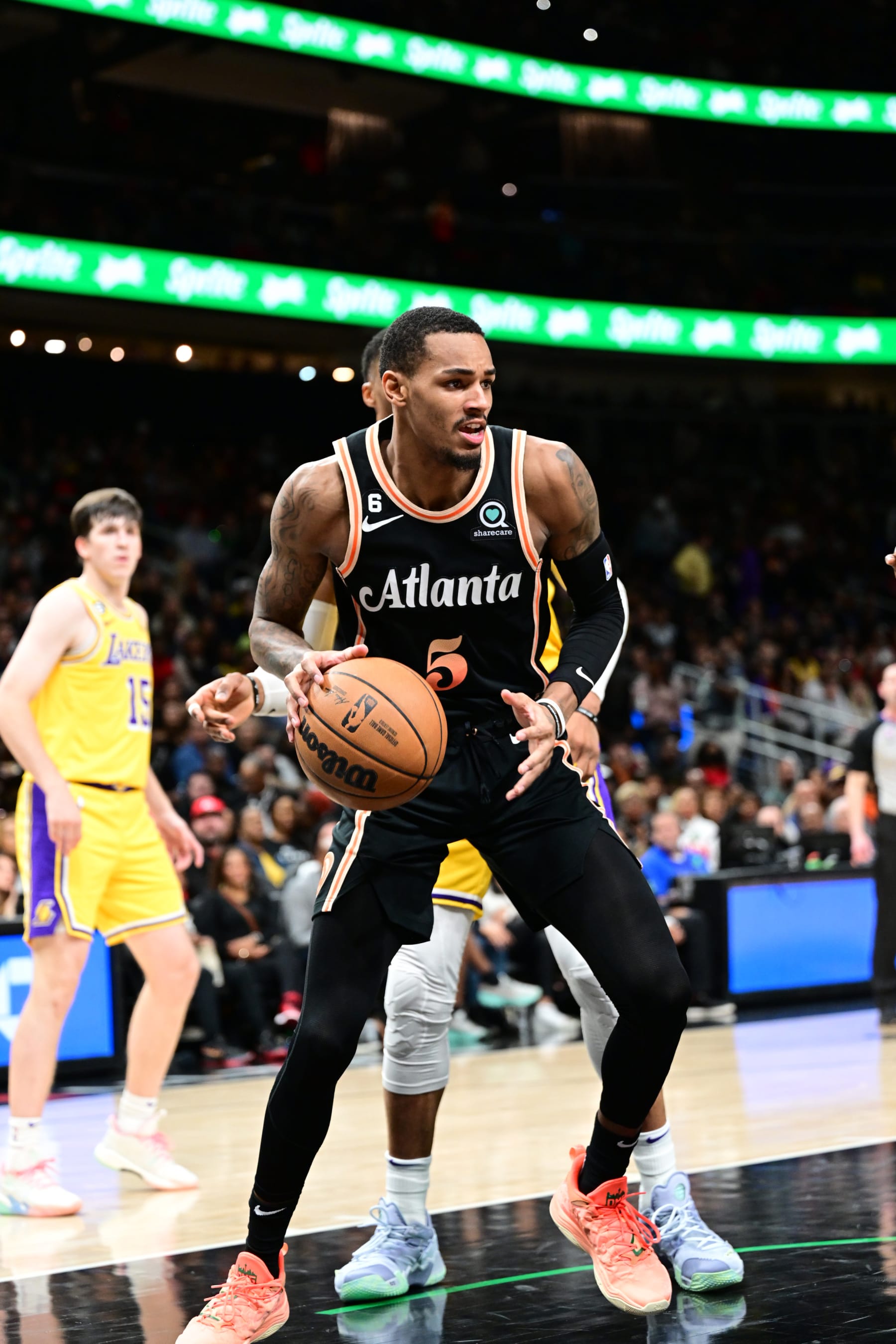 ATLANTA, GA - DECEMBER 30: Dejounte Murray #5 of the Atlanta Hawks handles the ball during the game against the Los Angeles Lakers on December 1, 2022 at State Farm Arena in Atlanta, Georgia.  NOTE TO USER: User expressly acknowledges and agrees that, by downloading and/or using this Photograph, user is consenting to the terms and conditions of the Getty Images License Agreement. Mandatory Copyright Notice: Copyright 2022 NBAE (Photo by Adam Hagy/NBAE via Getty Images)