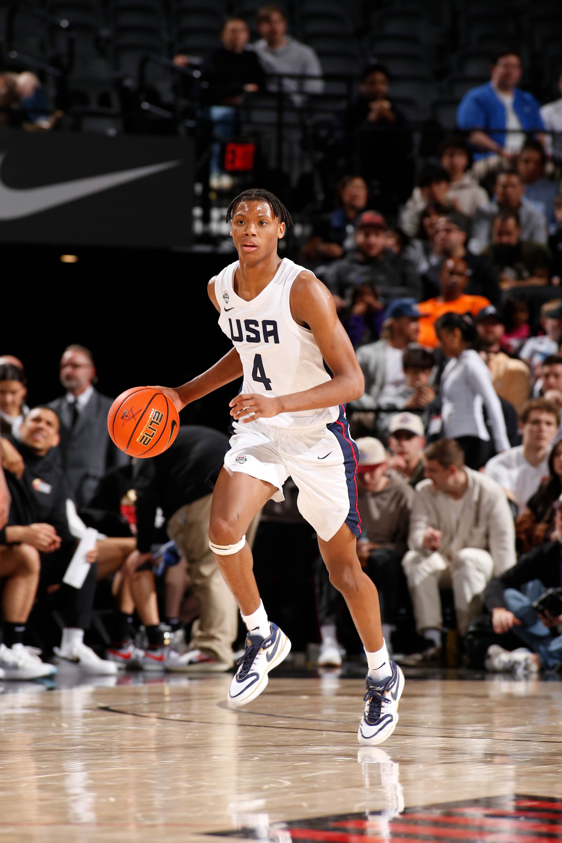 PORTLAND, OR - APRIL 13: Airious Bailey #4 of Team USA dribbles the ball during the game against Team World during the 2024 Nike Hoop Summit on April 13, 2024 at the Moda Center Arena in Portland, Oregon. NOTE TO USER: User expressly acknowledges and agrees that, by downloading and or using this photograph, user is consenting to the terms and conditions of the Getty Images License Agreement. Mandatory Copyright Notice: Copyright 2024 NBAE (Photo by Cameron Browne/NBAE via Getty Images)