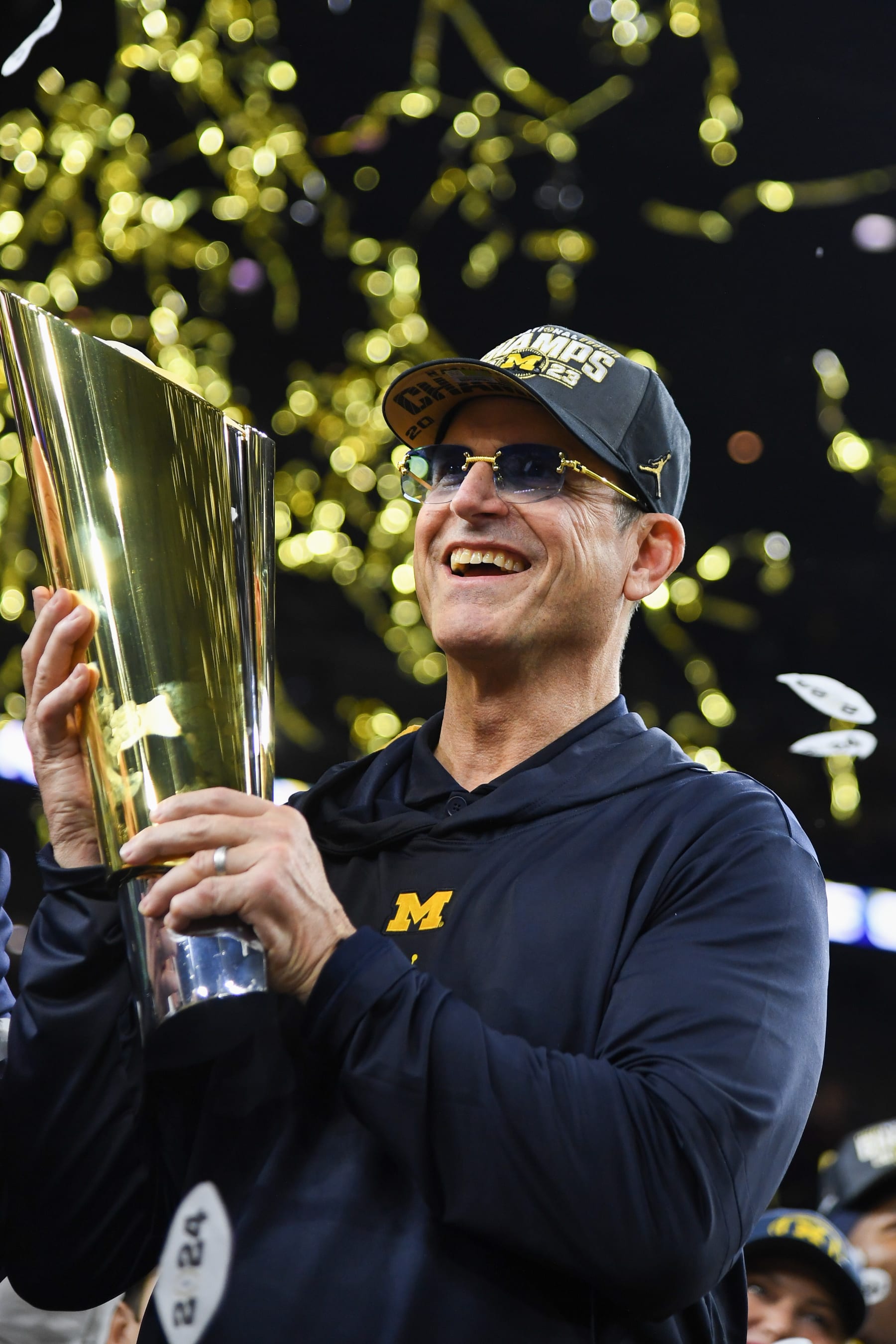 HOUSTON, TEXAS - JANUARY 8: Michigan Wolverines head coach Jim Harbaugh celebrates winning the 2024 CFP National Championship game at NRG Stadium on January 8, 2024 in Houston, Texas. (Photo by CFP/Getty Images)
