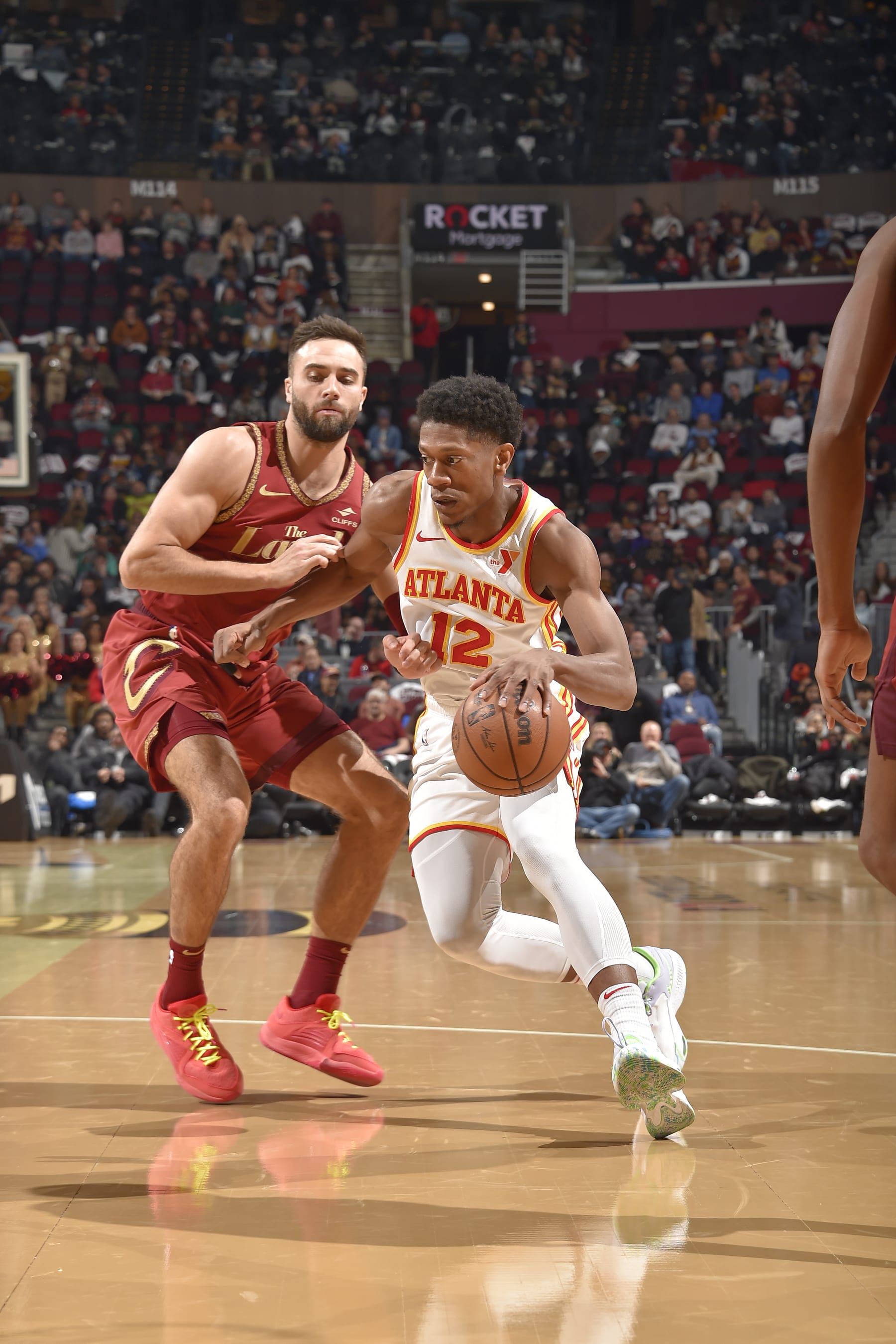 CLEVELAND, OH - NOVEMBER 28: De'Andre Hunter #12 of the Atlanta Hawks drives to the basket during the game against the Cleveland Cavaliers during the In-Season Tournament on November 28, 2023 at Rocket Mortgage FieldHouse in Cleveland, Ohio. NOTE TO USER: User expressly acknowledges and agrees that, by downloading and/or using this Photograph, user is consenting to the terms and conditions of the Getty Images License Agreement. Mandatory Copyright Notice: Copyright 2023 NBAE (Photo by David Liam Kyle/NBAE via Getty Images)