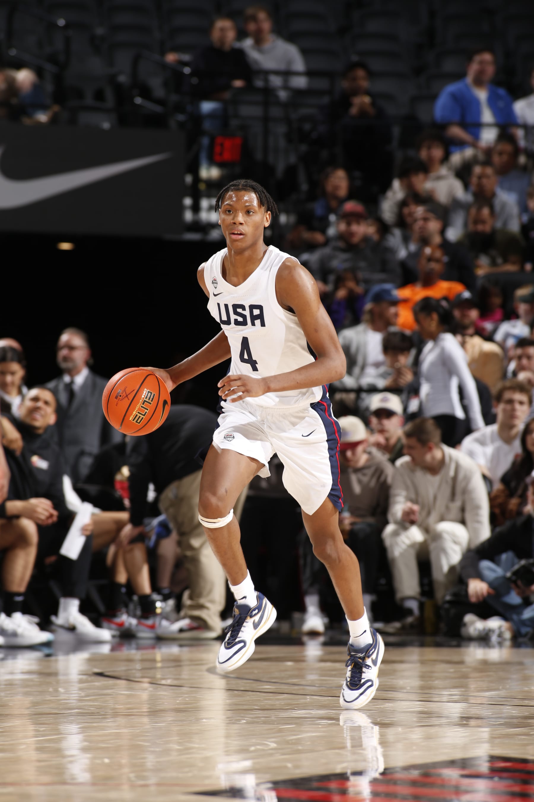 PORTLAND, OR - APRIL 13: Airious Bailey #4 of Team USA dribbles the ball during the game against Team World during the 2024 Nike Hoop Summit on April 13, 2024 at the Moda Center Arena in Portland, Oregon. NOTE TO USER: User expressly acknowledges and agrees that, by downloading and or using this photograph, user is consenting to the terms and conditions of the Getty Images License Agreement. Mandatory Copyright Notice: Copyright 2024 NBAE (Photo by Cameron Browne/NBAE via Getty Images)