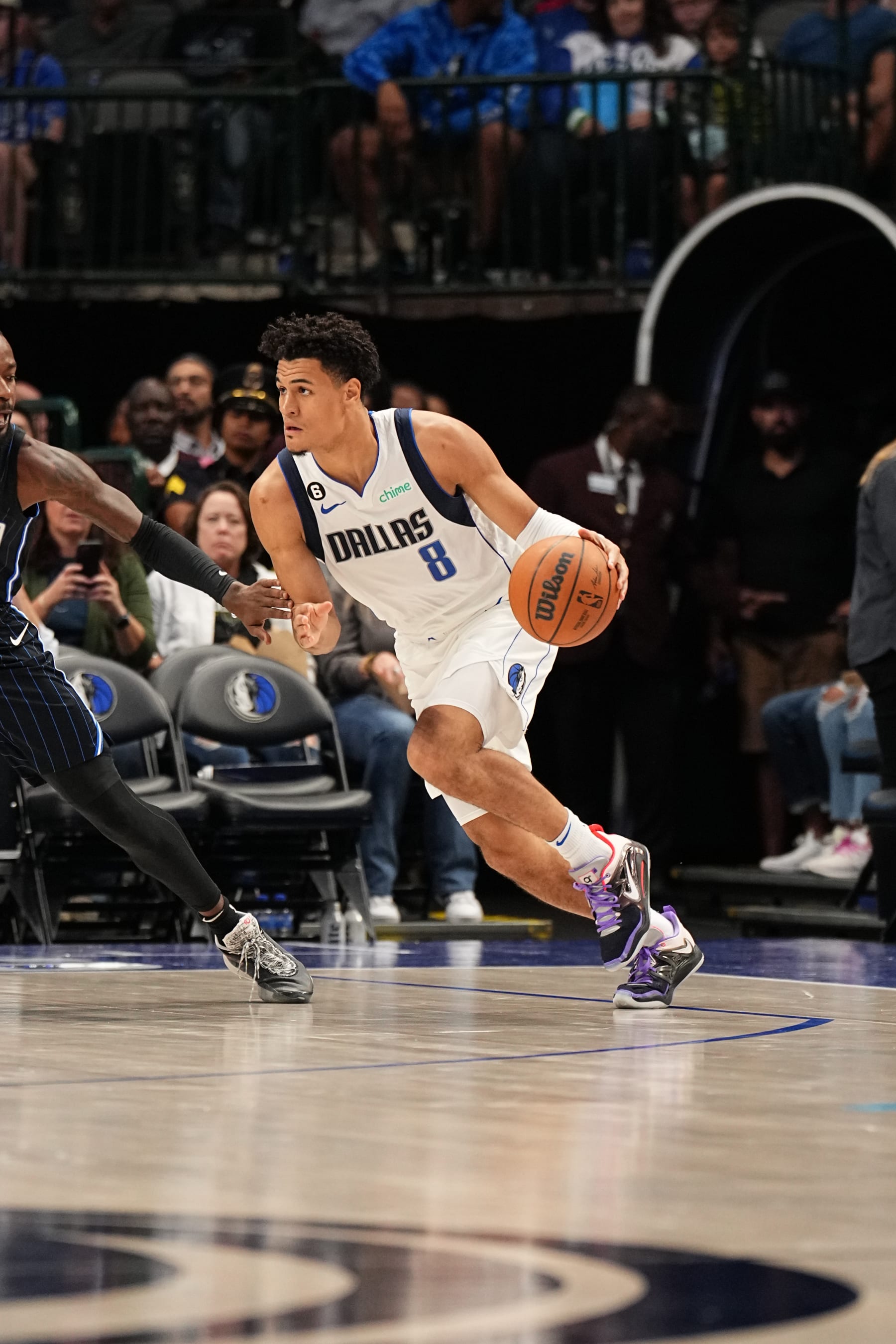 DALLAS, TX - OCTOBER 7: Josh Green #8 of the Dallas Mavericks dribbles the ball against the Orlando Magic during a preseason game on October 7, 2022 at the American Airlines Center in Dallas, Texas. NOTE TO USER: User expressly acknowledges and agrees that, by downloading and or using this photograph, User is consenting to the terms and conditions of the Getty Images License Agreement. Mandatory Copyright Notice: Copyright 2022 NBAE (Photo by Glenn James/NBAE via Getty Images)