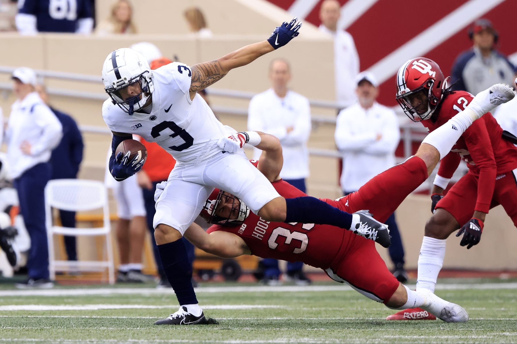 BLOOMINGTON, INDIANA - NOVEMBER 05: Parker Washington #3 of the Penn State Nittany Lions is tackled by Ryan Barnes #39 of the Indiana Hoosiers during the second half at Memorial Stadium on November 05, 2022 in Bloomington, Indiana. (Photo by Justin Casterline/Getty Images)