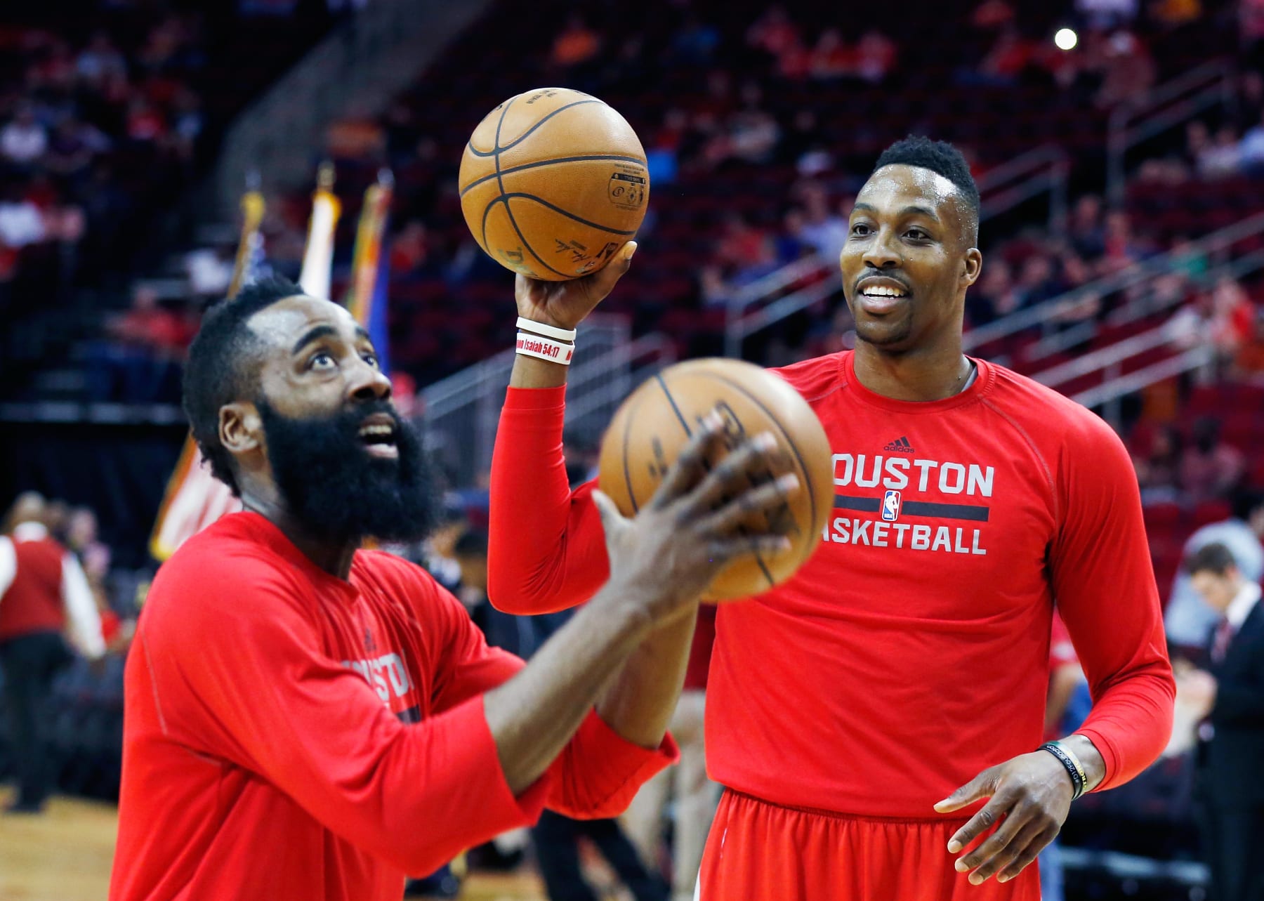 HOUSTON, TX - MARCH 27:  James Harden #13 and Dwight Howard #12 of the Houston Rockets warm up on the court before their game against the Minnesota Timberwolves at the Toyota Center on March 27, 2015 in Houston, Texas. NOTE TO USER: User expressly acknowledges and agrees that, by downloading and/or using this photograph, user is consenting to the terms and conditions of the Getty Images License Agreement.  (Photo by Scott Halleran/Getty Images)
