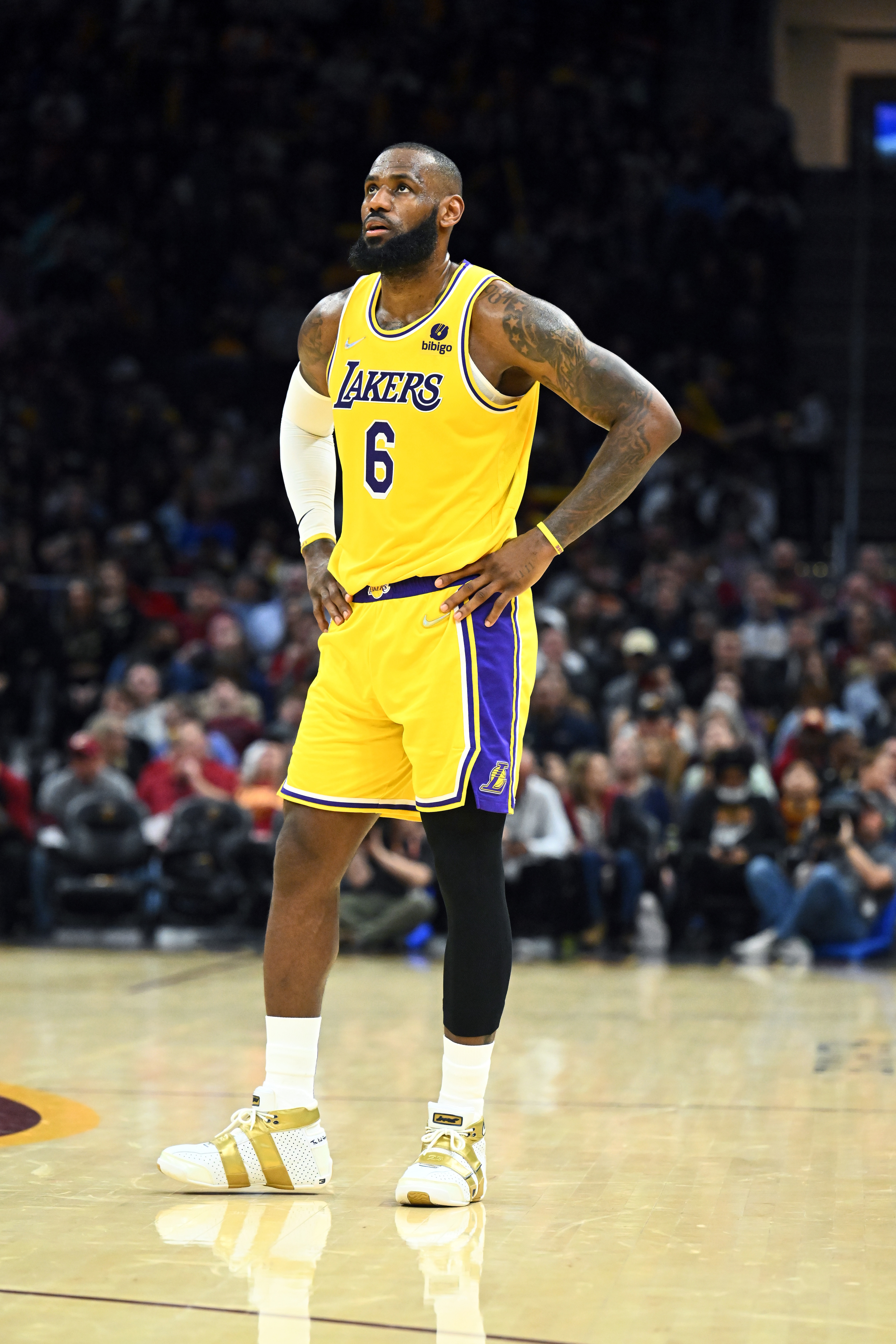 CLEVELAND, OHIO - MARCH 21: LeBron James #6 of the Los Angeles Lakers pauses on the court during the fourth quarter against the Cleveland Cavaliers at Rocket Mortgage Fieldhouse on March 21, 2022 in Cleveland, Ohio. The Lakers defeated the Cavaliers 131-120. NOTE TO USER: User expressly acknowledges and agrees that, by downloading and/or using this photograph, user is consenting to the terms and conditions of the Getty Images License Agreement. (Photo by Jason Miller/Getty Images)