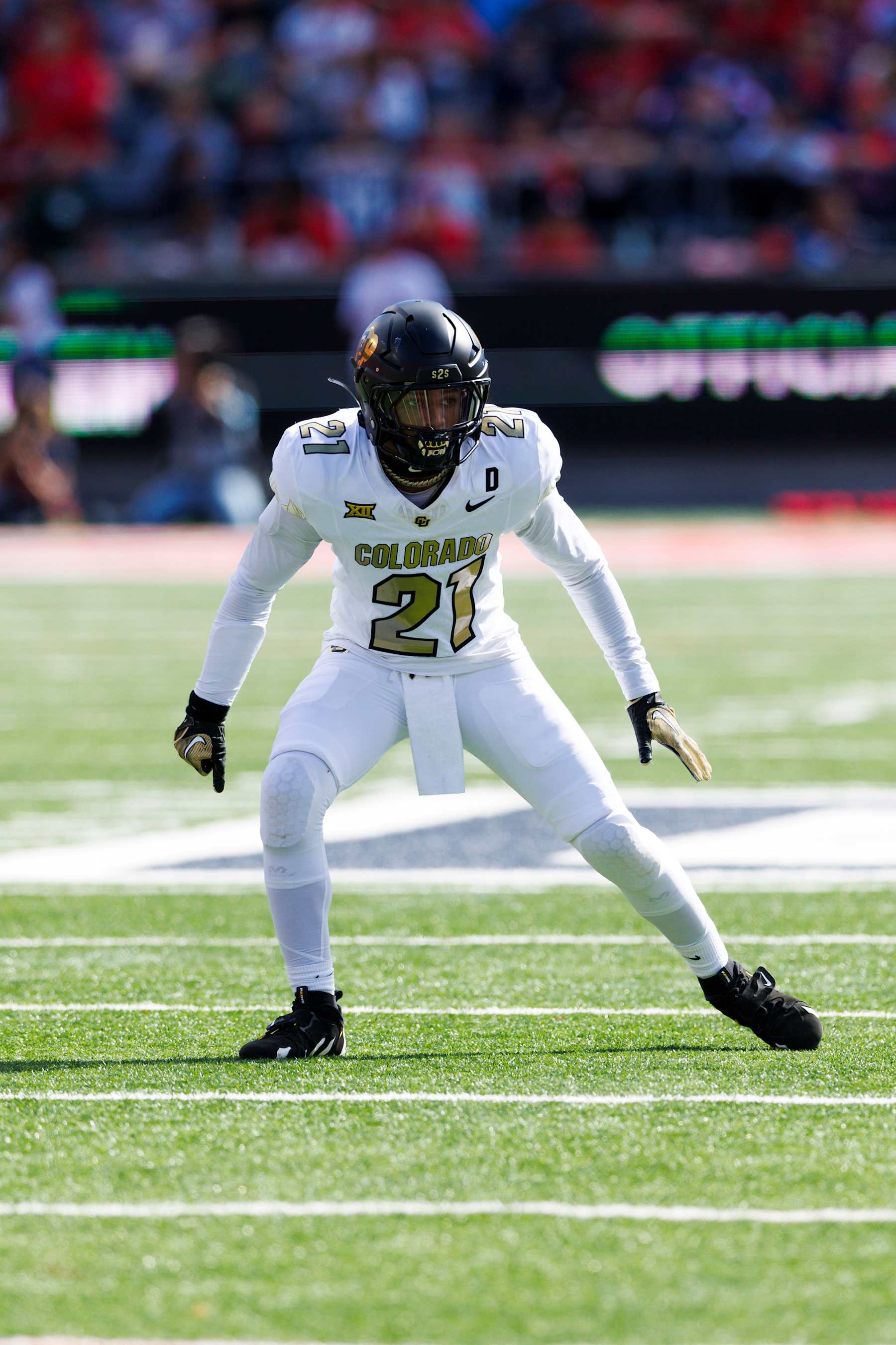 TUCSON, ARIZONA - OCTOBER 19: Shilo Sanders #21 of the Colorado Buffaloes defends during the first half against Arizona Wildcats at Arizona Stadium on October 19, 2024 in Tucson, Arizona. (Photo by Ric Tapia/Getty Images)