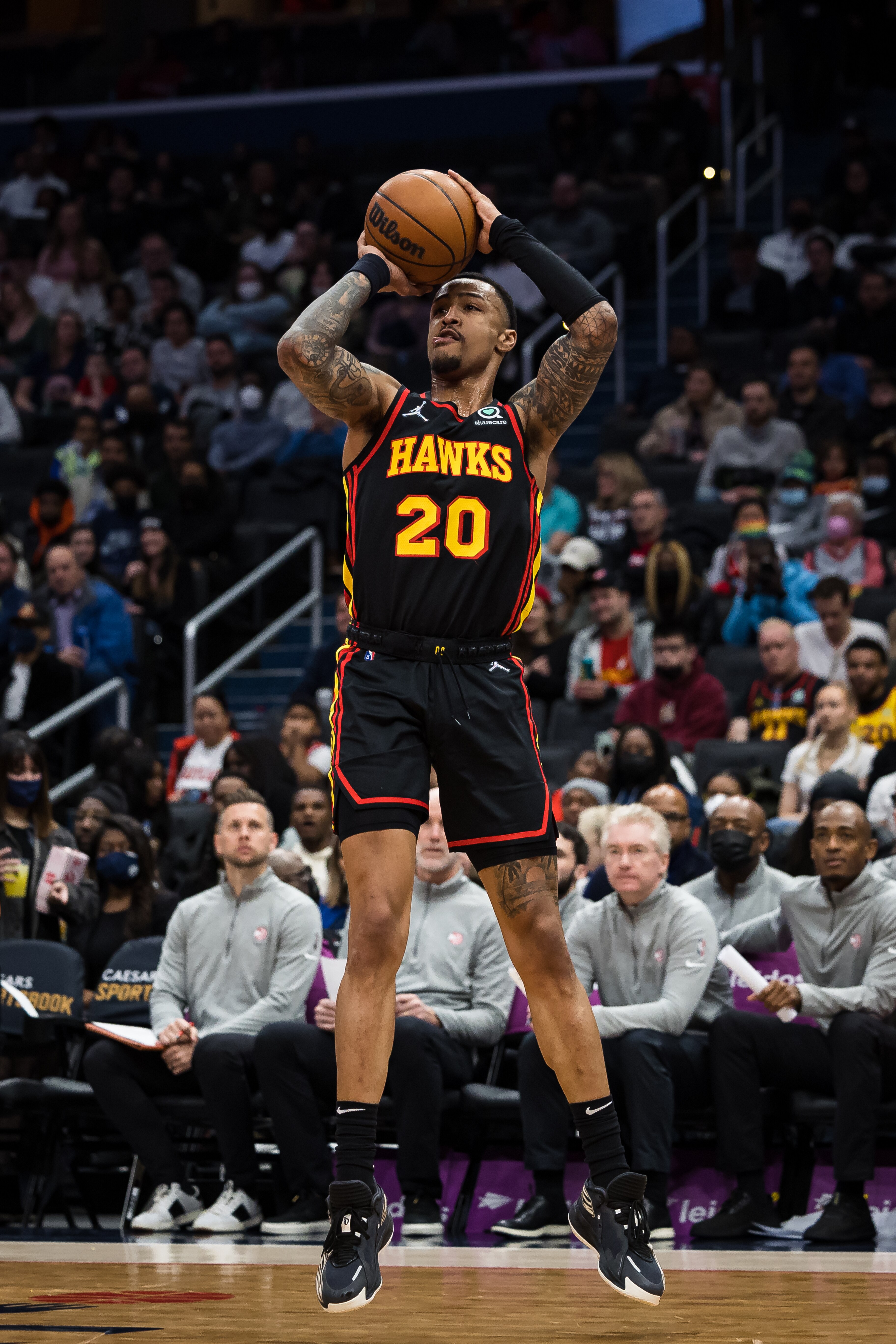WASHINGTON, DC - MARCH 04: John Collins #20 of the Atlanta Hawks shoots the ball against the Washington Wizards during the first half at Capital One Arena on March 4, 2022 in Washington, DC. NOTE TO USER: User expressly acknowledges and agrees that, by downloading and or using this photograph, User is consenting to the terms and conditions of the Getty Images License Agreement. (Photo by Scott Taetsch/Getty Images)