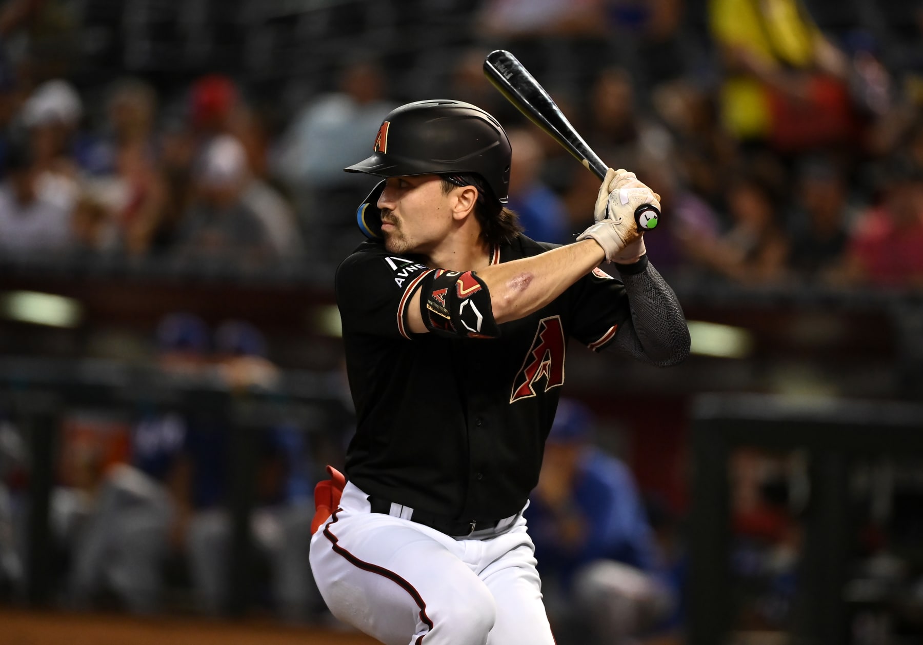 PHOENIX, ARIZONA - AUGUST 22: Corbin Carroll #7 of the Arizona Diamondbacks gets ready in the batters box against the Texas Rangers at Chase Field on August 22, 2023 in Phoenix, Arizona. (Photo by Norm Hall/Getty Images)