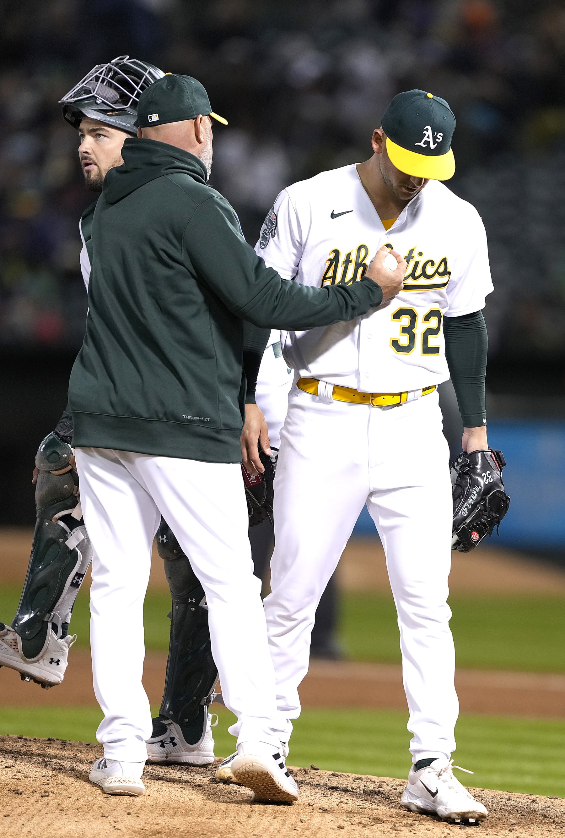 OAKLAND, CALIFORNIA - APRIL 14: Manager Mark Kotsay #7 of the Oakland Athletics takes the ball from starting pitcher James Kaprielian #32 taking Kprielian out of the game against the New York Mets in the top of the fourth inning at RingCentral Coliseum on April 14, 2023 in Oakland, California. (Photo by Thearon W. Henderson/Getty Images) OAKLAND, CALIFORNIA - APRIL 14: Manager Mark Kotsay #7 of the Oakland Athletics takes the ball from starting pitcher James Kaprielian #32 taking Kprielian out of the game against the New York Mets in the top of the fourth inning at RingCentral Coliseum on April 14, 2023 in Oakland, California. (Photo by Thearon W. Henderson/Getty Images)