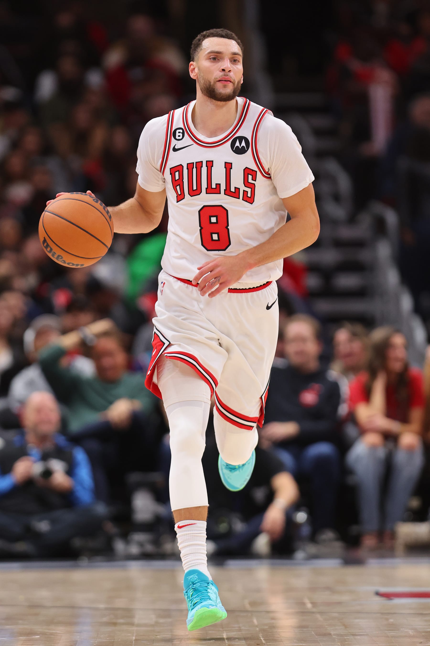 CHICAGO, ILLINOIS - NOVEMBER 07: Zach LaVine #8 of the Chicago Bulls dribbles up the court against the Toronto Raptors during the second half at United Center on November 07, 2022 in Chicago, Illinois. NOTE TO USER: User expressly acknowledges and agrees that, by downloading and or using this photograph, User is consenting to the terms and conditions of the Getty Images License Agreement.  (Photo by Michael Reaves/Getty Images)