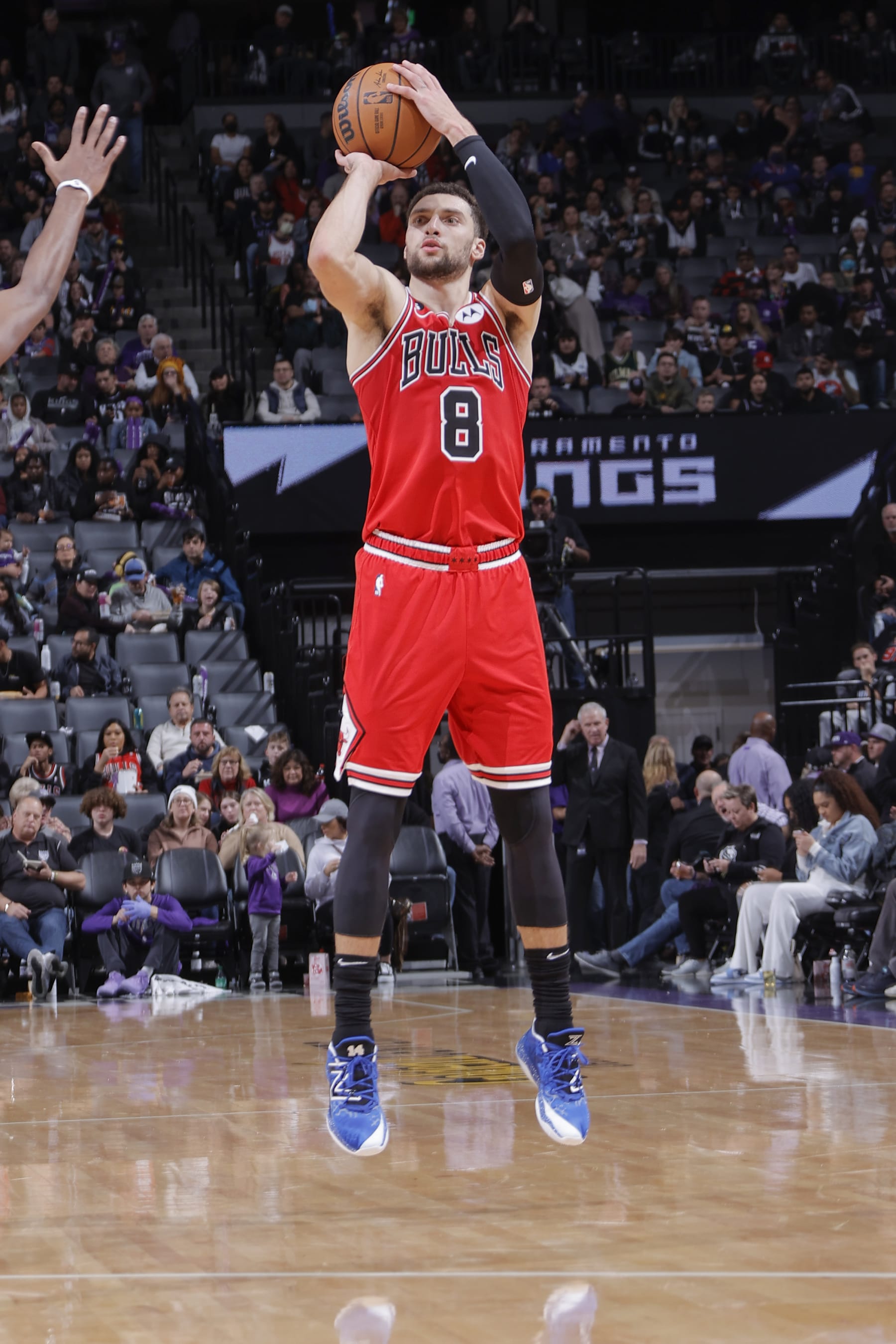 SACRAMENTO, CA - DECEMBER 4: Zach LaVine #8 of the Chicago Bulls shoots a three point basket during the game against the Sacramento Kings  on December 4, 2022 at Golden 1 Center in Sacramento, California. NOTE TO USER: User expressly acknowledges and agrees that, by downloading and or using this Photograph, user is consenting to the terms and conditions of the Getty Images License Agreement. Mandatory Copyright Notice: Copyright 2022 NBAE (Photo by Rocky Widner/NBAE via Getty Images)