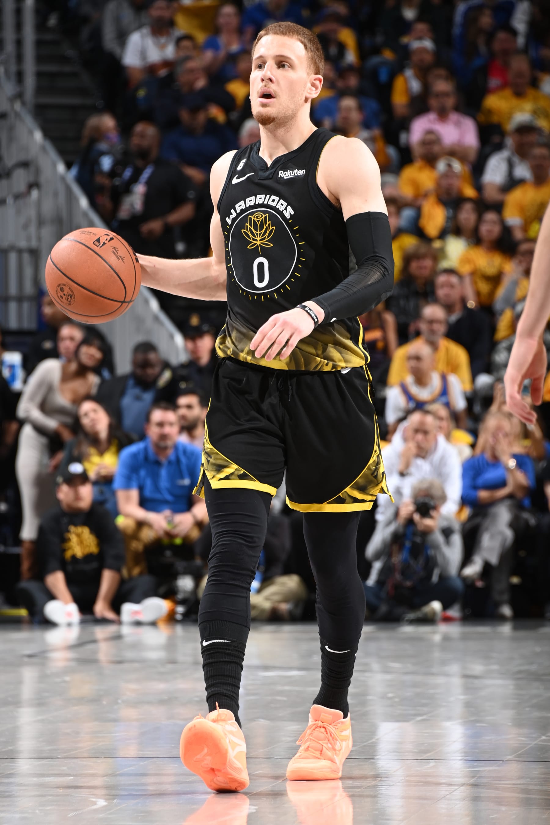 LOS ANGELES, CA - May 2: Donte DiVincenzo #0 of the Golden State Warriors moves the ball during Game 1 of the Western Conference Semi-Finals 2023 NBA Playoffs on May 2, 2023 at Crypto.Com Arena in Los Angeles, California. NOTE TO USER: User expressly acknowledges and agrees that, by downloading and/or using this Photograph, user is consenting to the terms and conditions of the Getty Images License Agreement. Mandatory Copyright Notice: Copyright 2023 NBAE (Photo by Andrew D. Bernstein/NBAE via Getty Images)