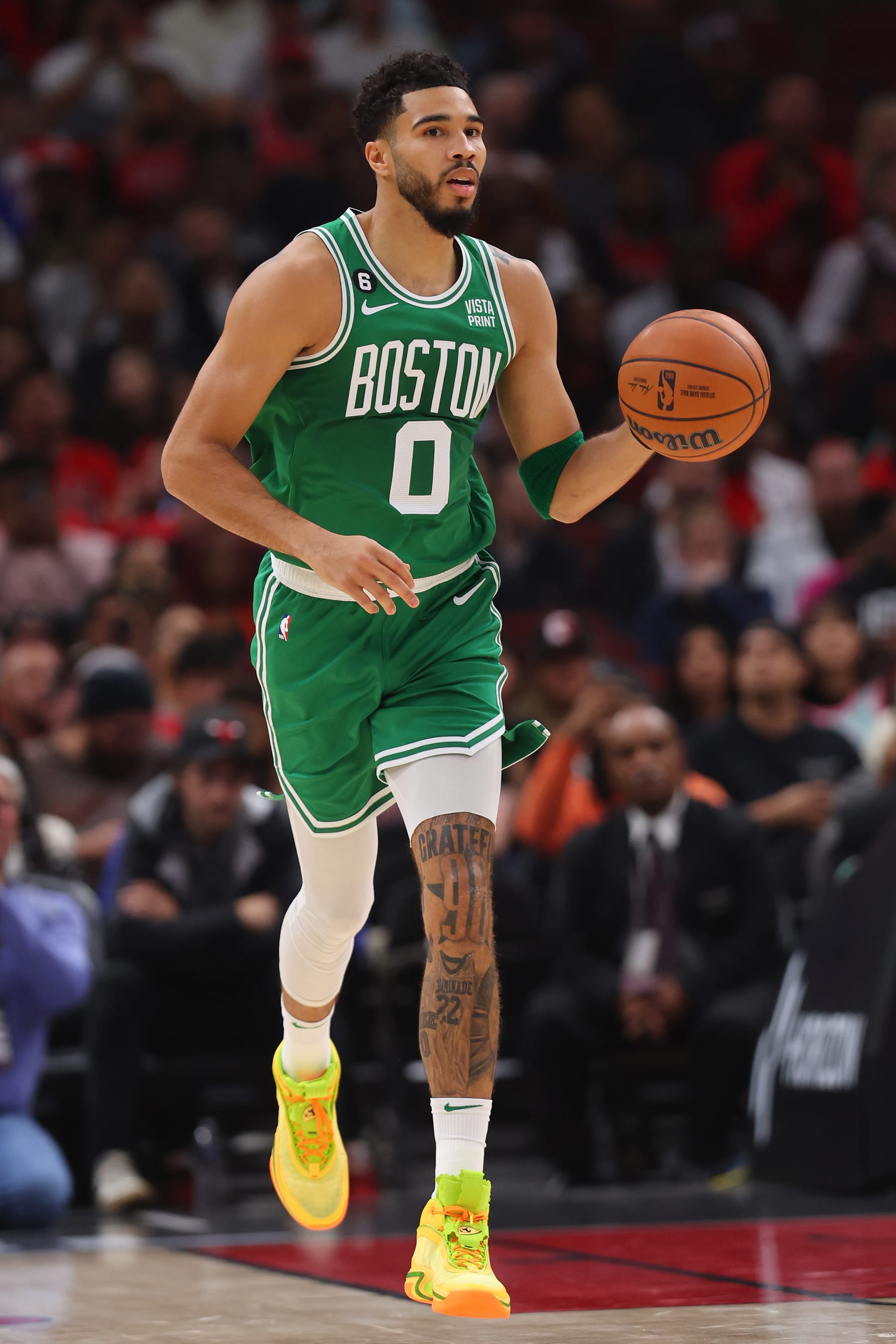CHICAGO, ILLINOIS - OCTOBER 24: Jayson Tatum #0 of the Boston Celtics dribbles up the court against the Chicago Bulls during the first half at United Center on October 24, 2022 in Chicago, Illinois. NOTE TO USER: User expressly acknowledges and agrees that, by downloading and or using this photograph, User is consenting to the terms and conditions of the Getty Images License Agreement. (Photo by Michael Reaves/Getty Images)