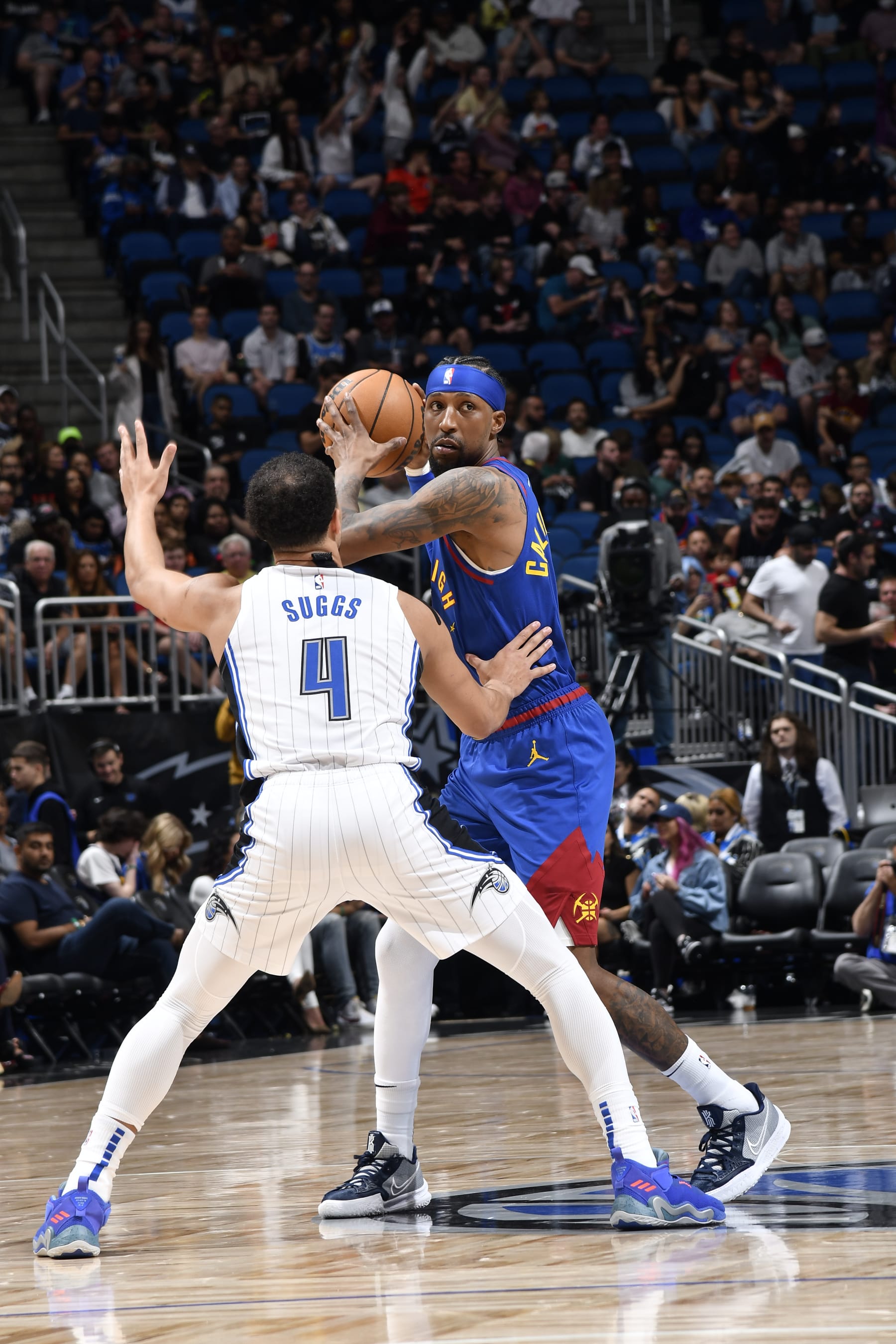 ORLANDO, FL - FEBRUARY 9: Kentavious Caldwell-Pope #5 of the Denver Nuggets handles the ball during the game against the Orlando Magic on February 9, 2023 at Amway Center in Orlando, Florida. NOTE TO USER: User expressly acknowledges and agrees that, by downloading and or using this photograph, User is consenting to the terms and conditions of the Getty Images License Agreement. Mandatory Copyright Notice: Copyright 2023 NBAE (Photo by Fernando Medina/NBAE via Getty Images)